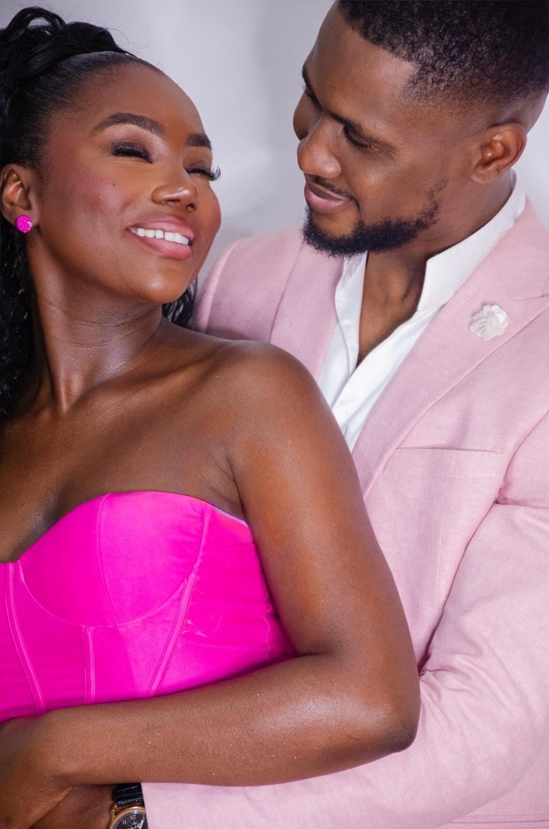 couple wearing silver-colored rings