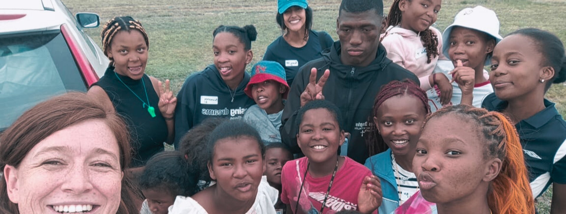 an abstract photo of a curved building with a blue sky in the background