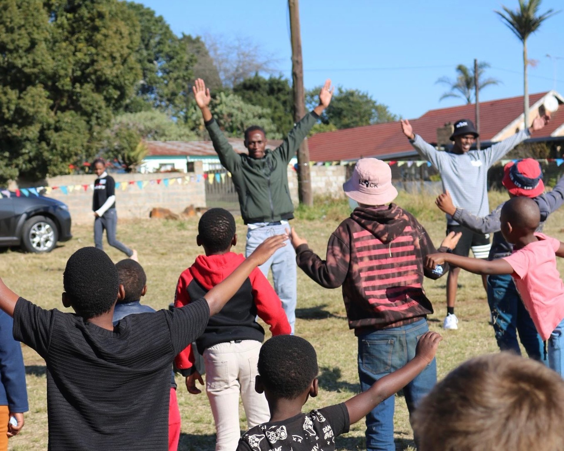 an abstract photo of a curved building with a blue sky in the background
