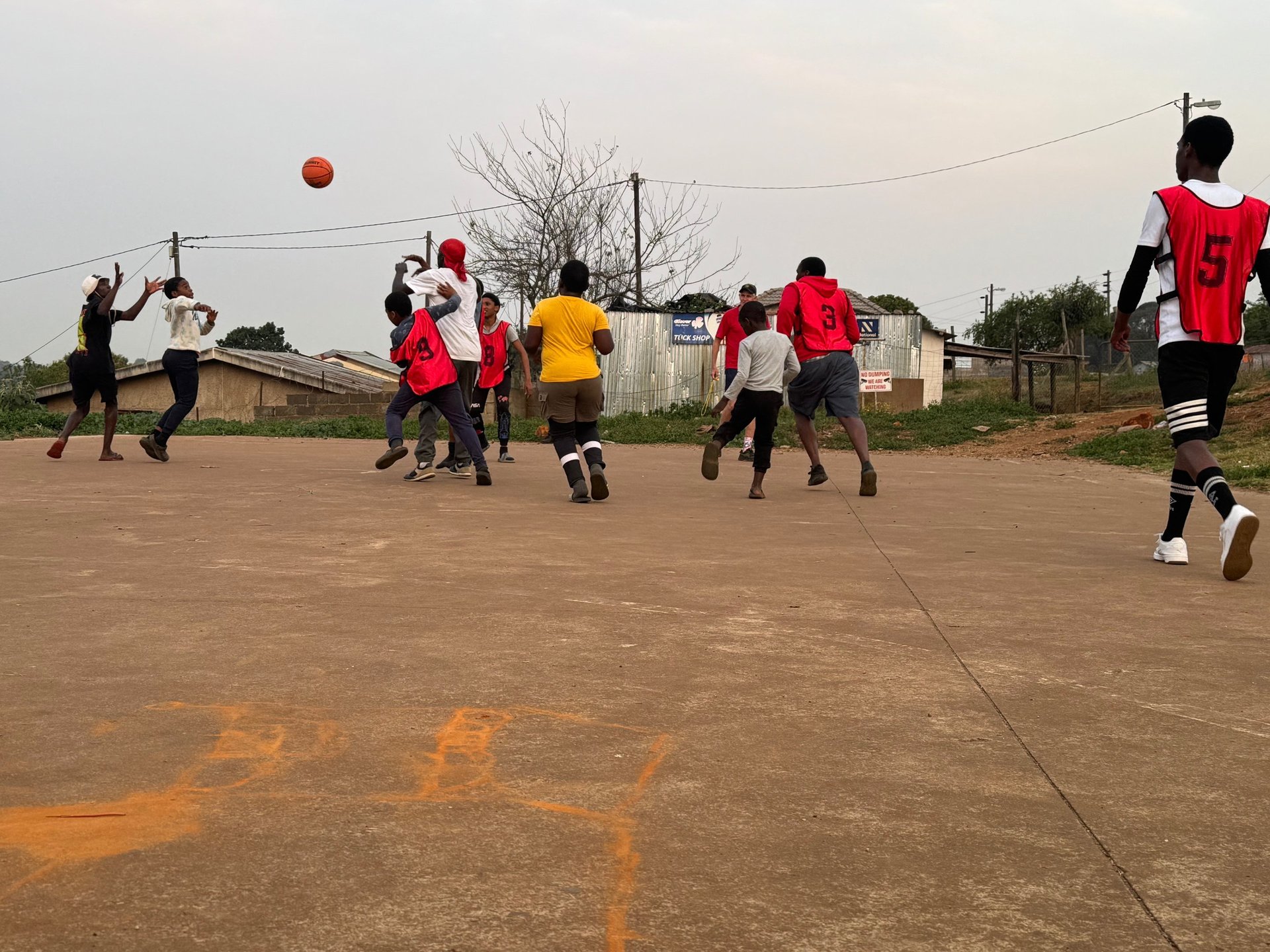 an abstract photo of a curved building with a blue sky in the background