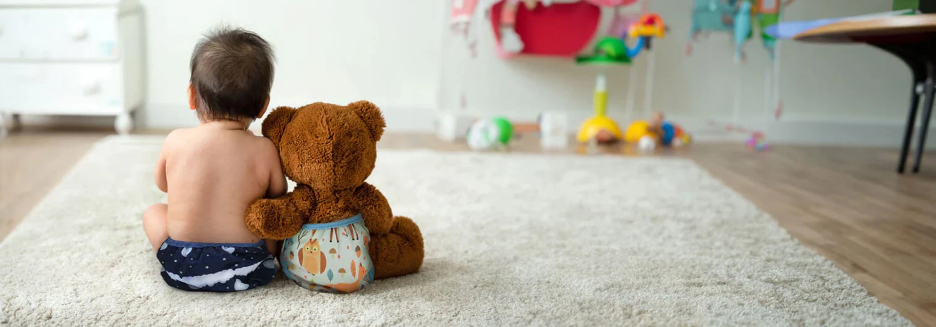 person holding baby feet