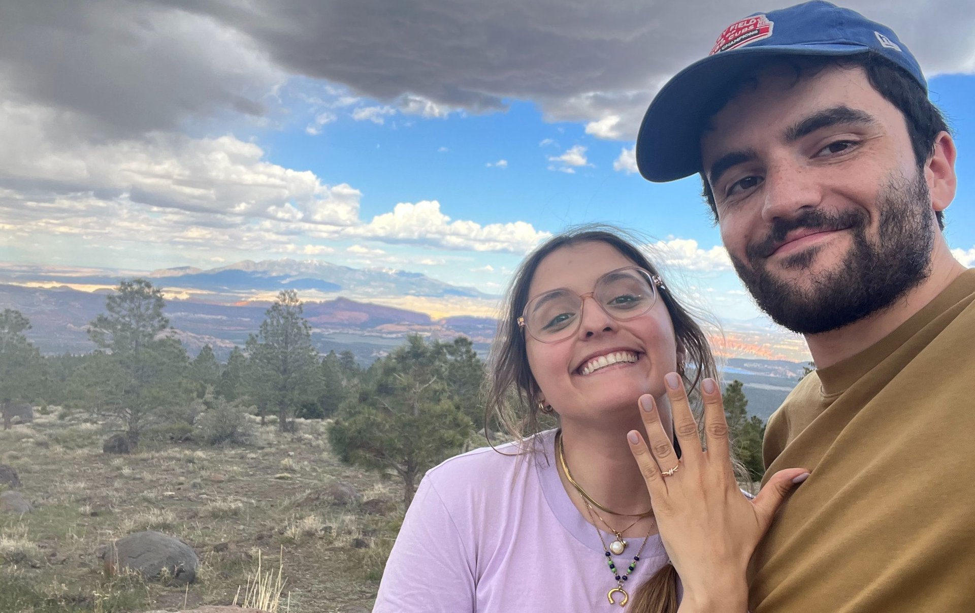 couple wearing silver-colored rings