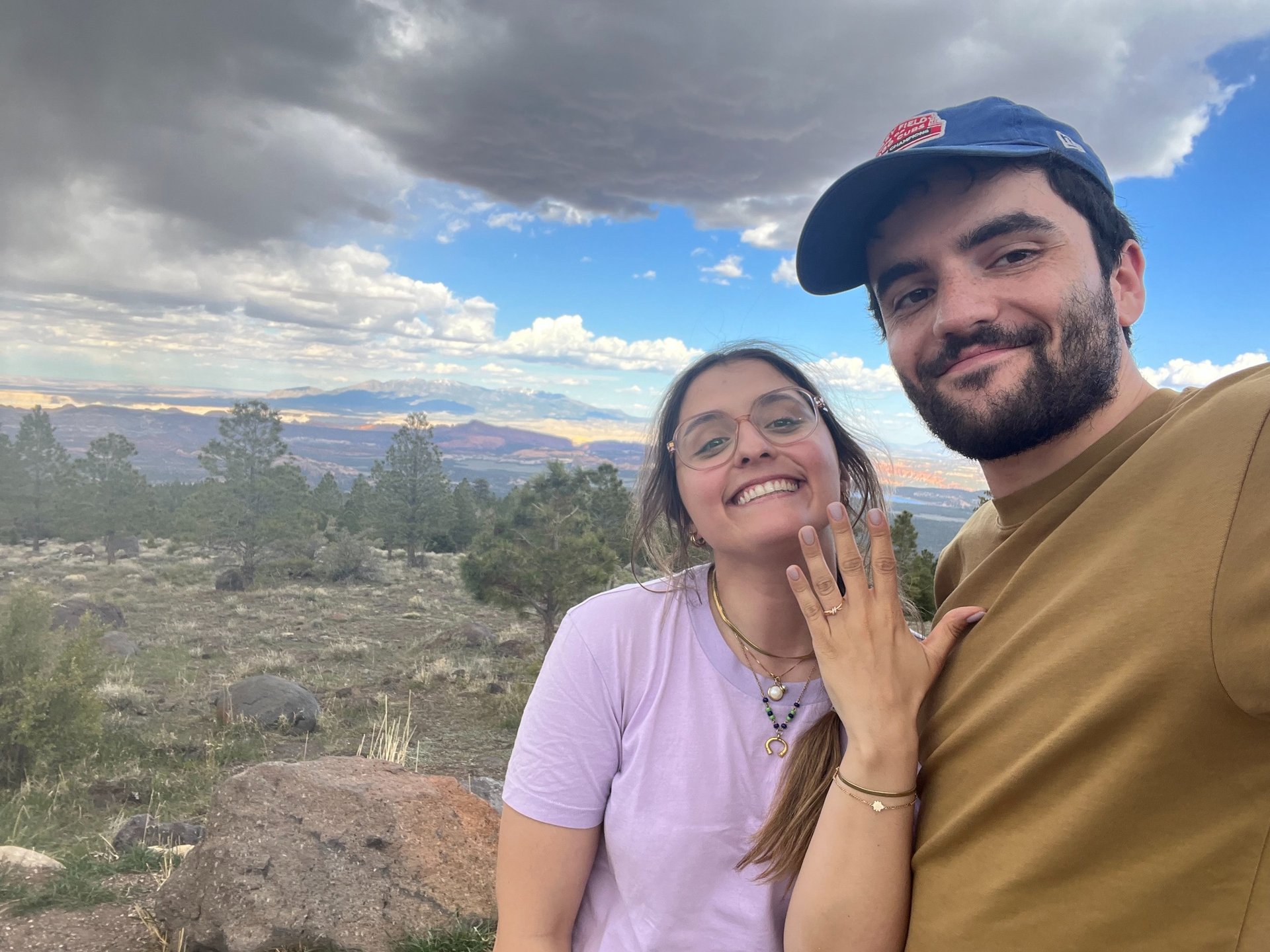 couple wearing silver-colored rings