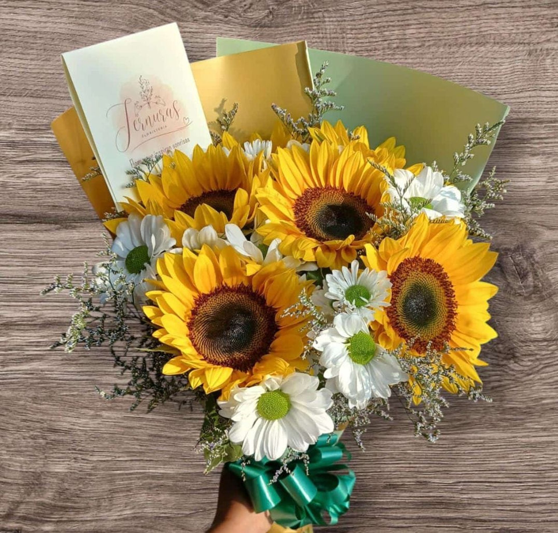 red and green flower petals on brown paper bag