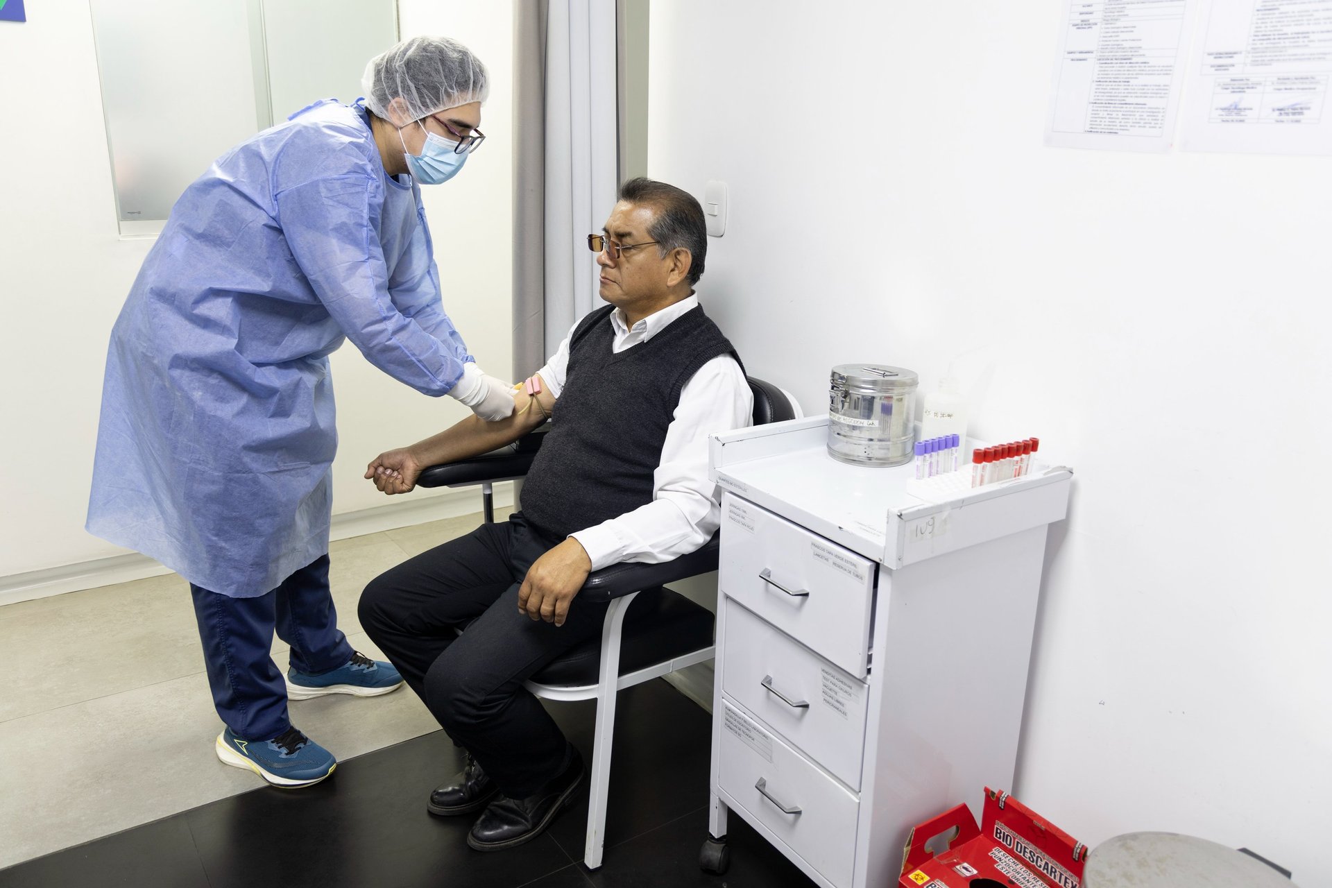 woman wearing yellow long-sleeved dress under white clouds and blue sky during daytime