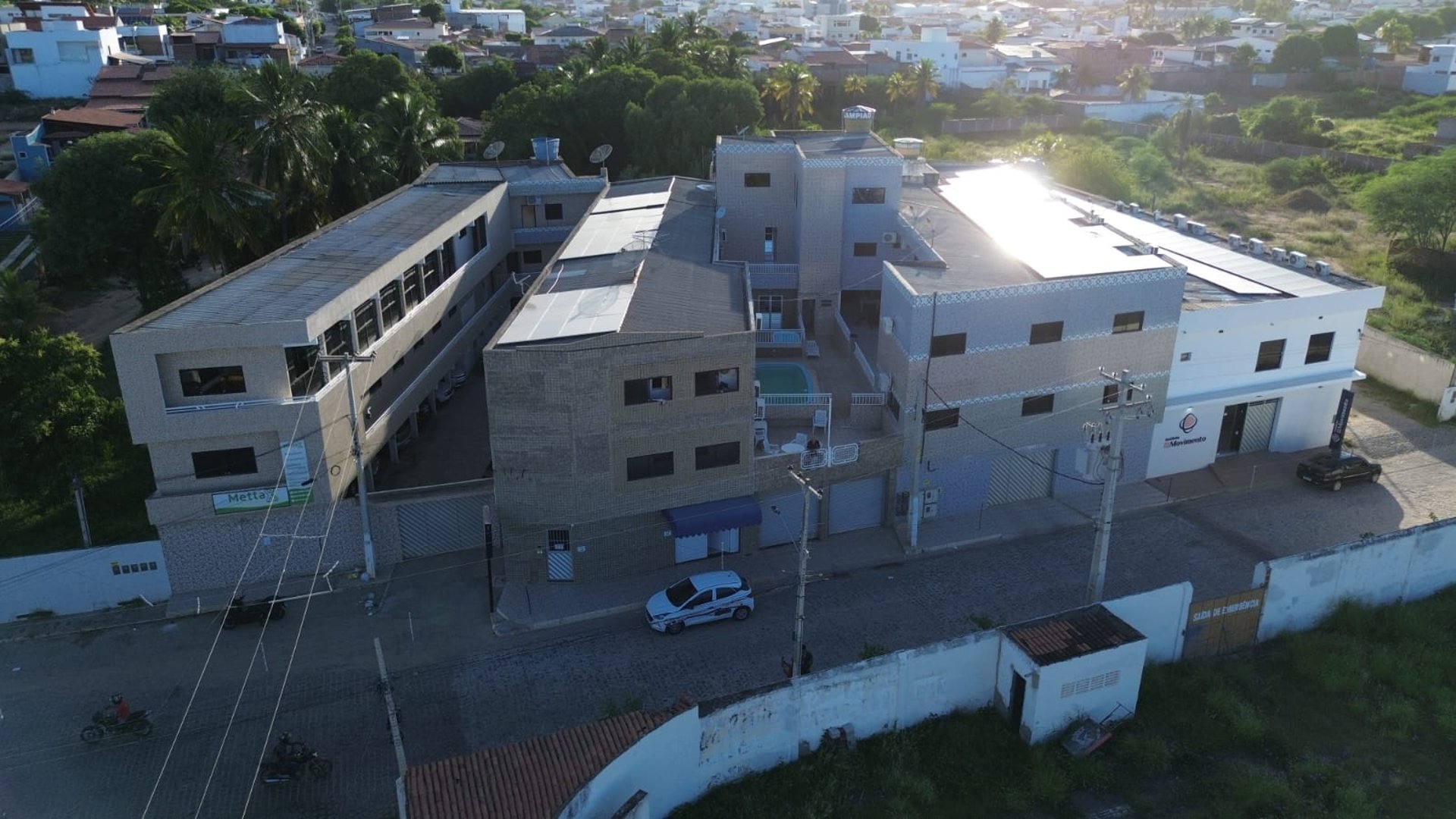 woman wearing yellow long-sleeved dress under white clouds and blue sky during daytime