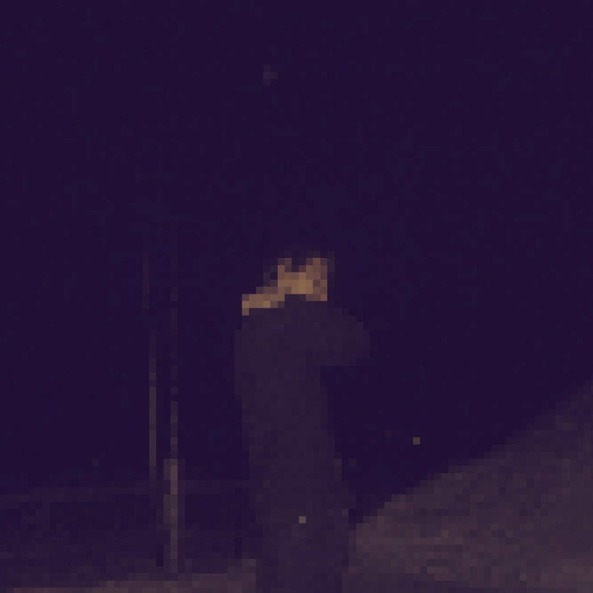 an abstract photo of a curved building with a blue sky in the background