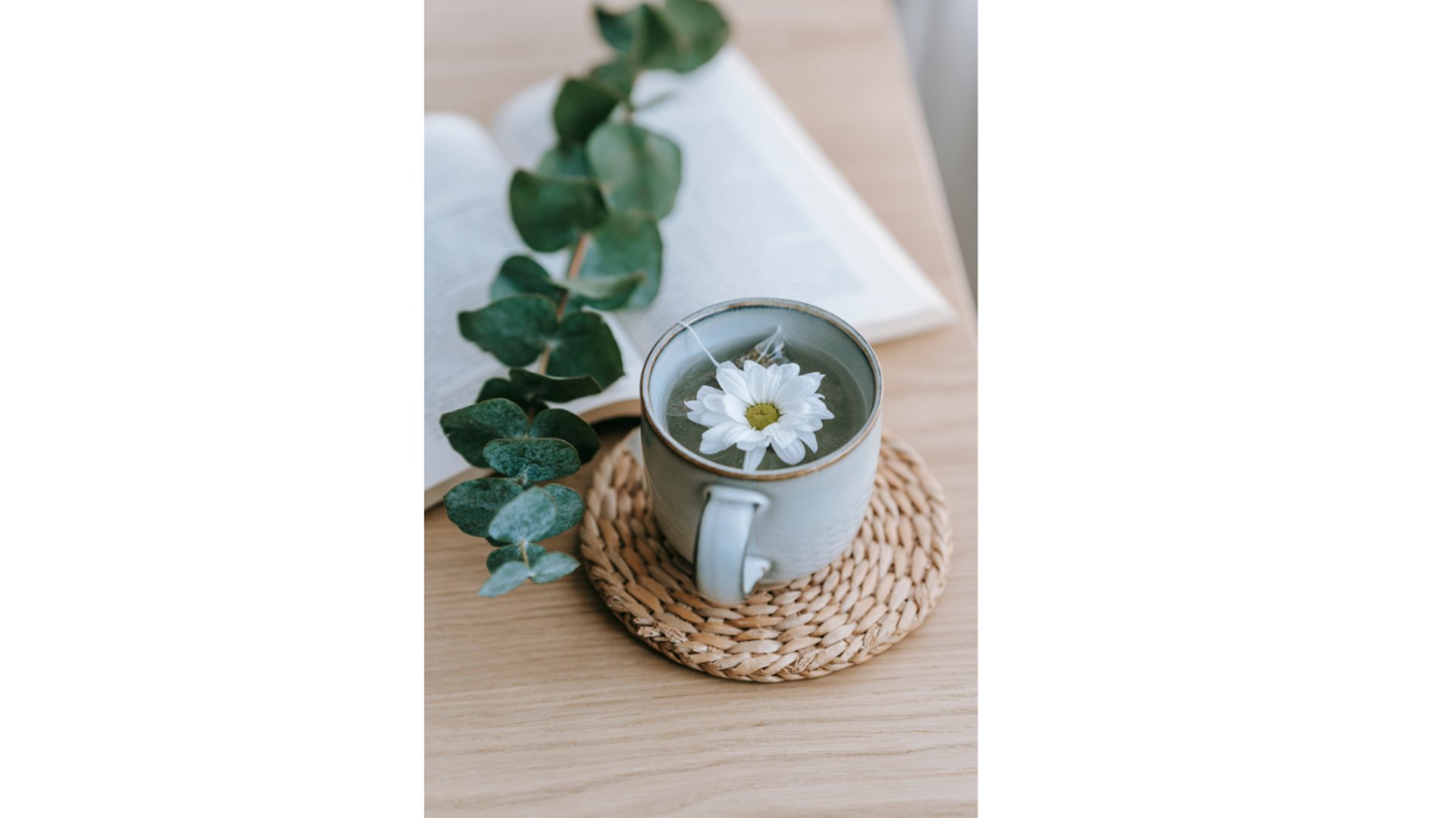 A cup of coffee with a smiley face on it
