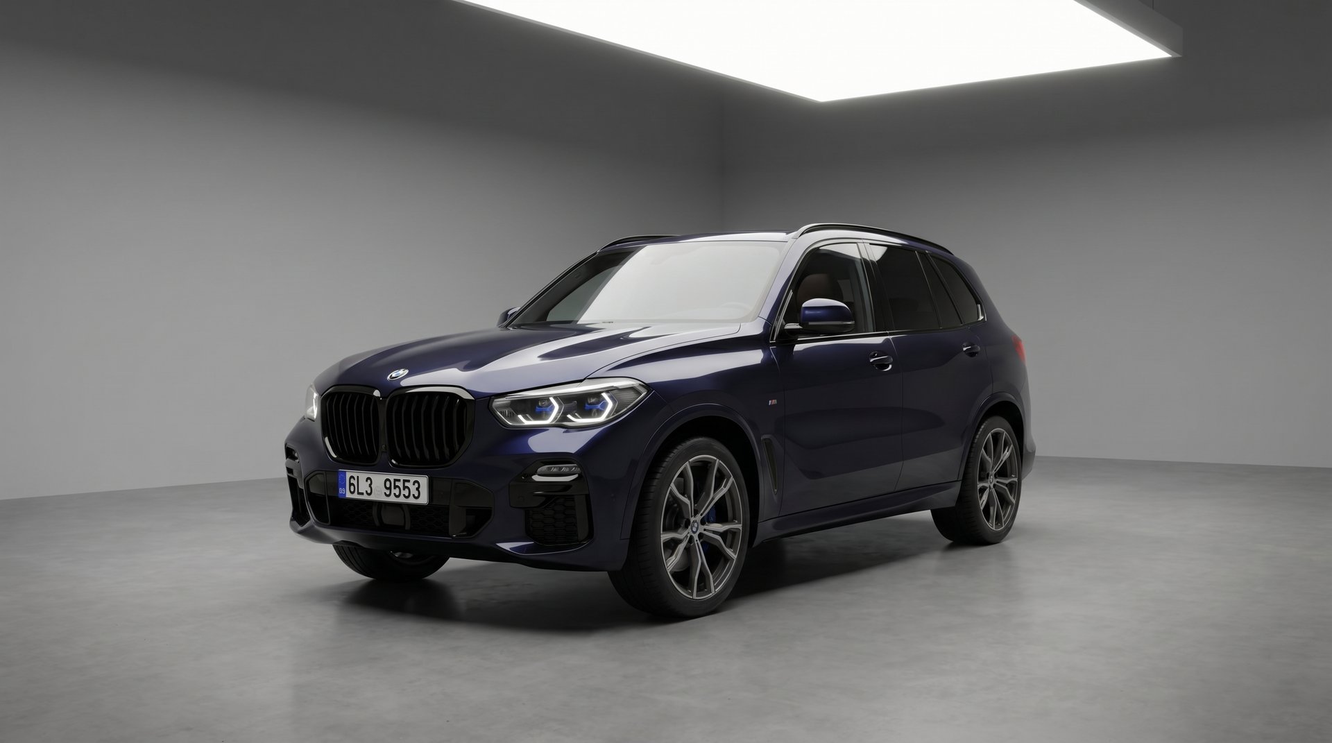 a black car parked in a parking garage
