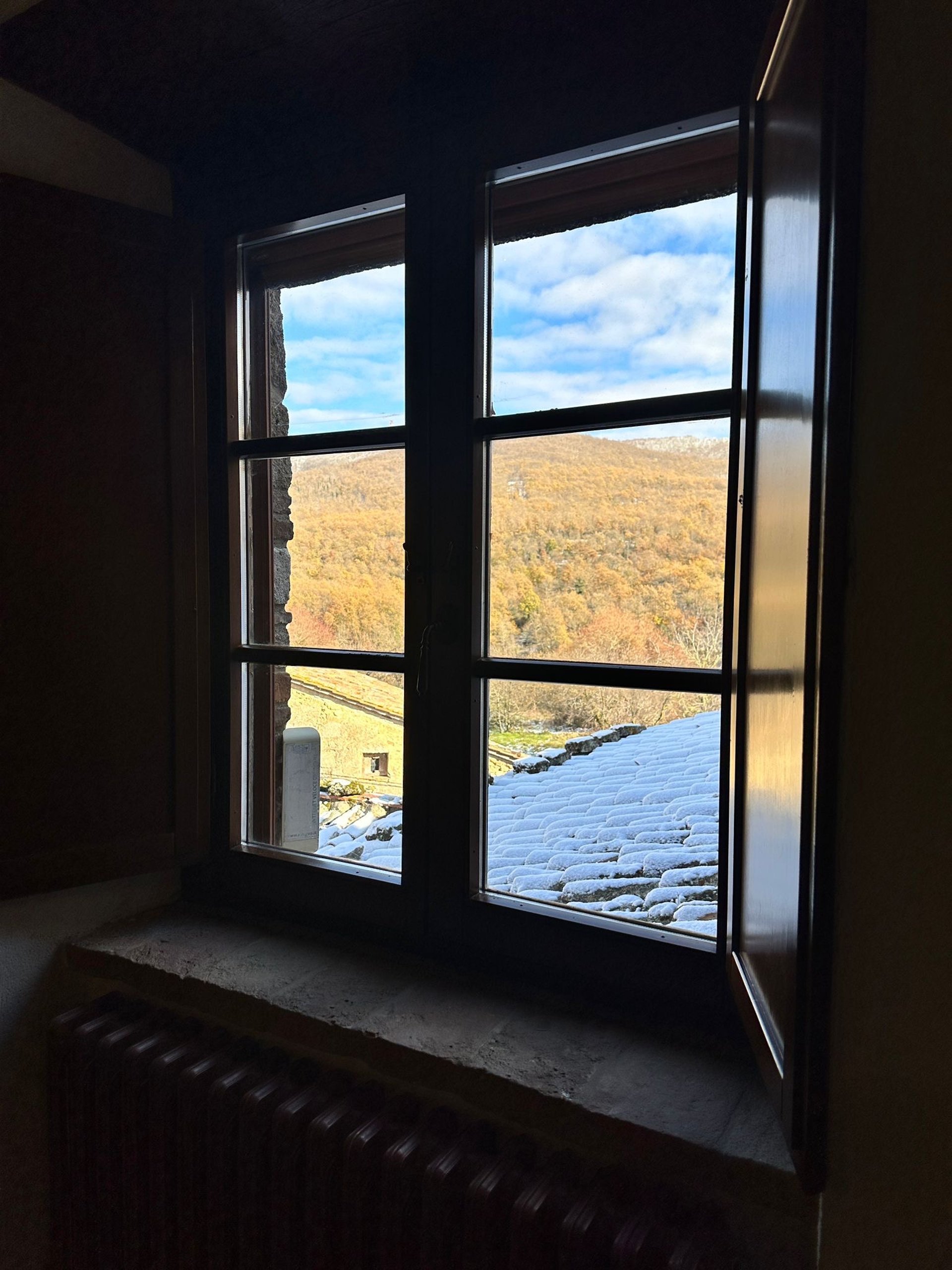an aerial view of a city by the ocean