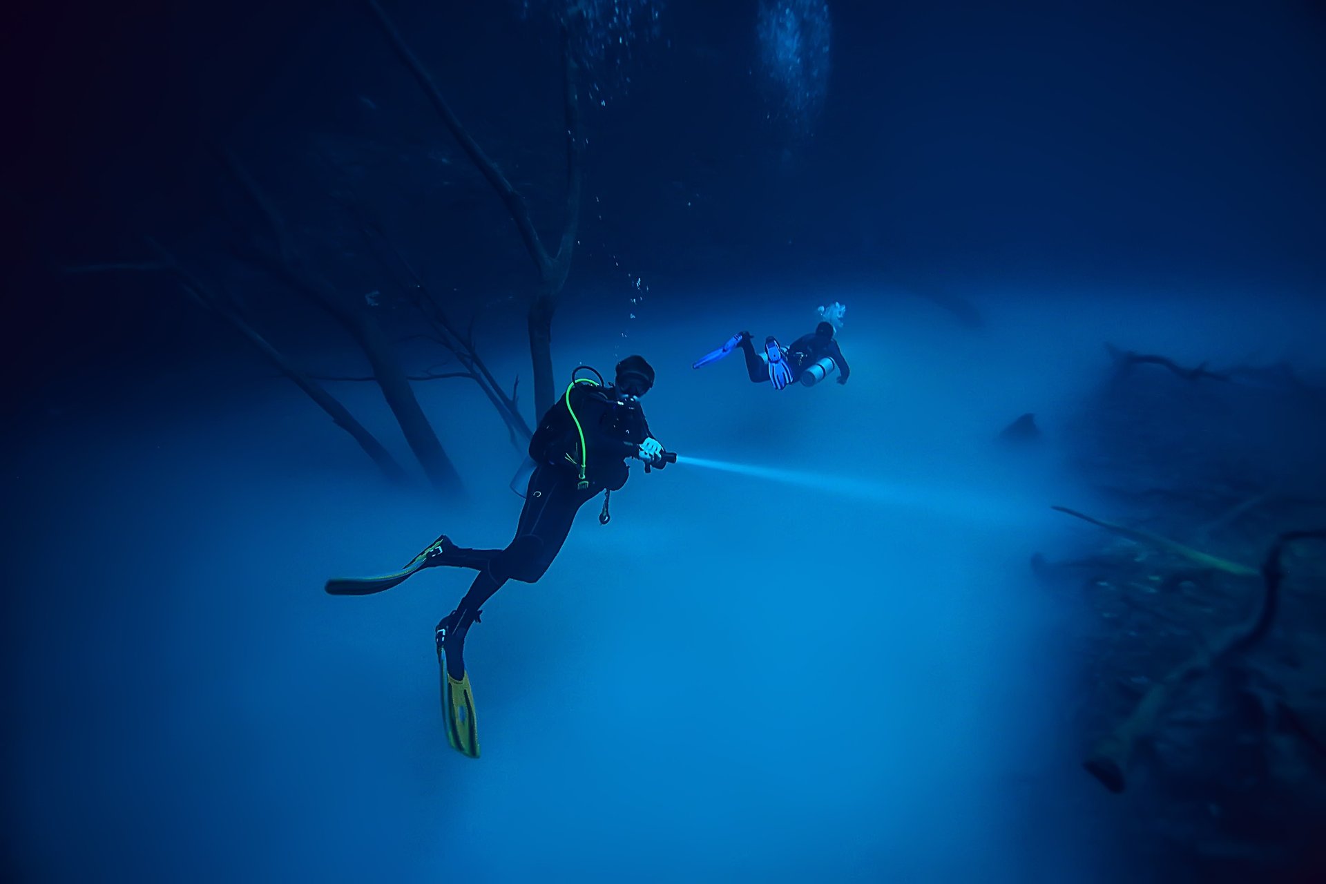 two person riding cable car