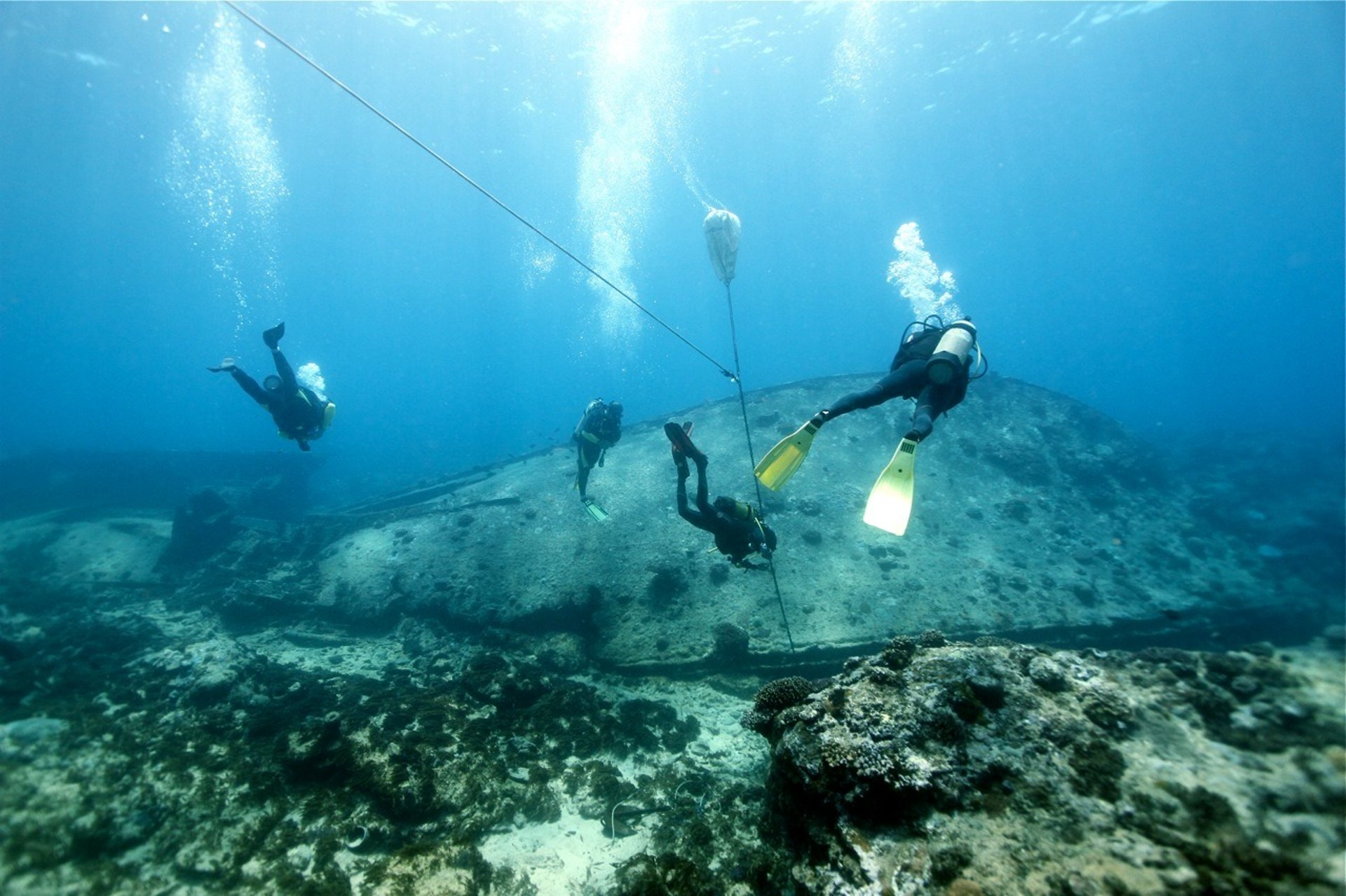 two person riding cable car