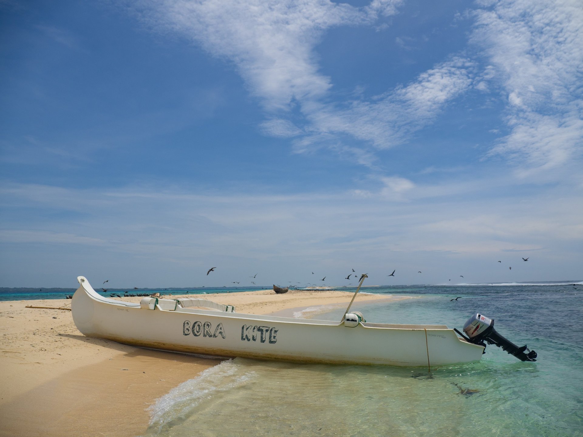 two person riding cable car