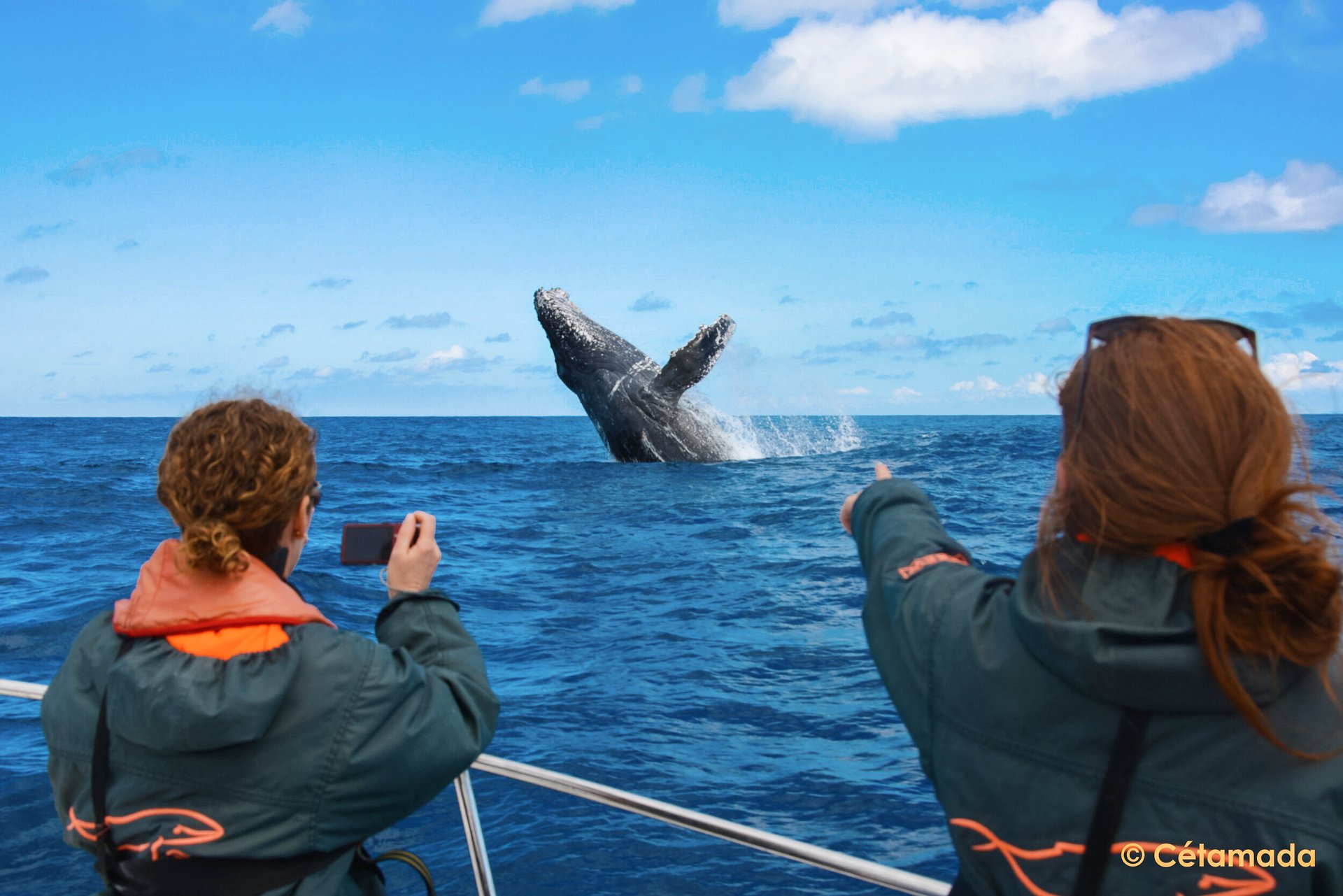 two person riding cable car