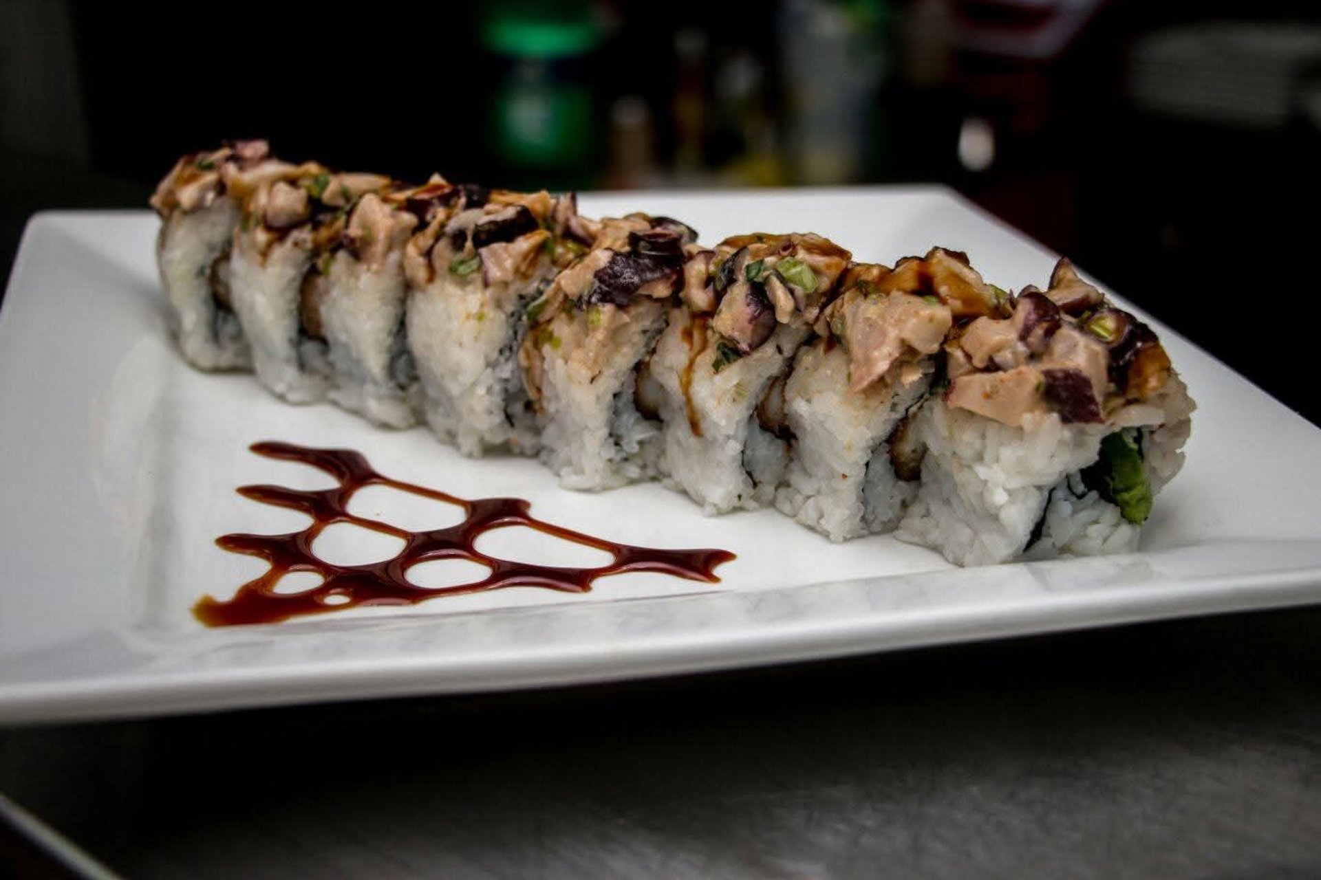 woman wearing yellow long-sleeved dress under white clouds and blue sky during daytime