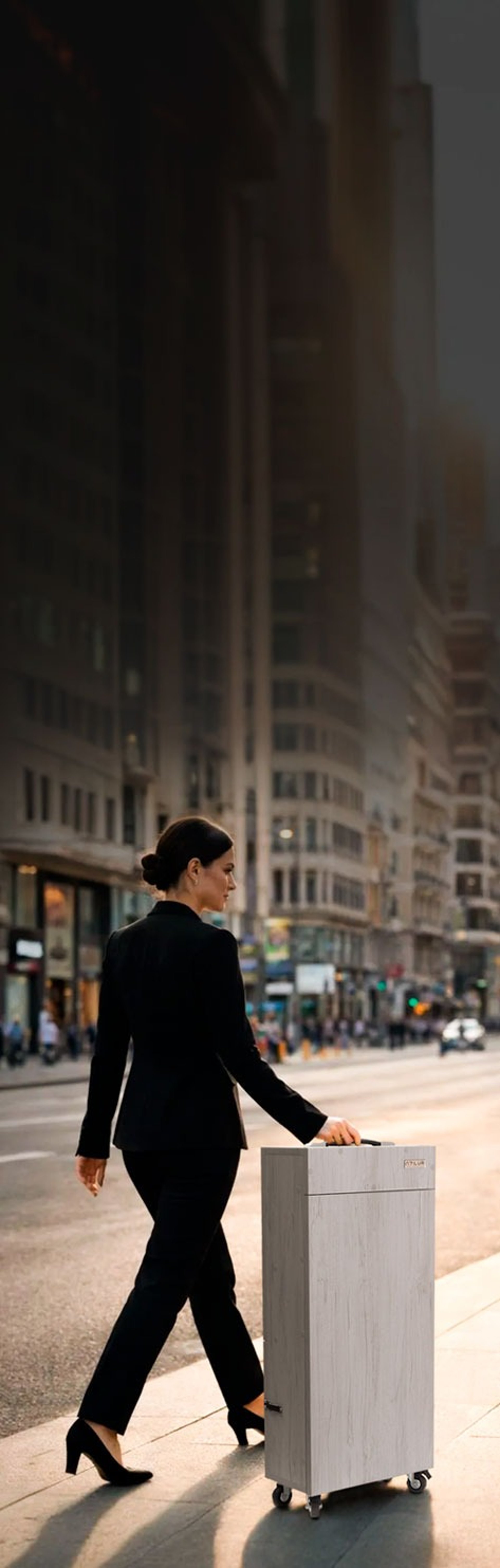 an abstract photo of a curved building with a blue sky in the background
