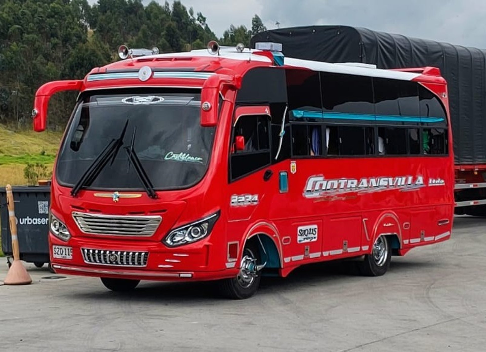 black and brown leather padded tub sofa