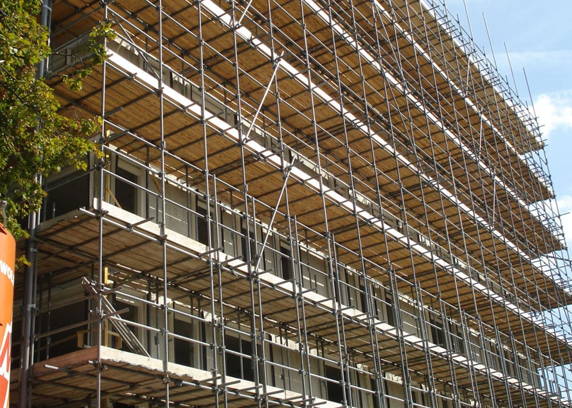 black and brown leather padded tub sofa