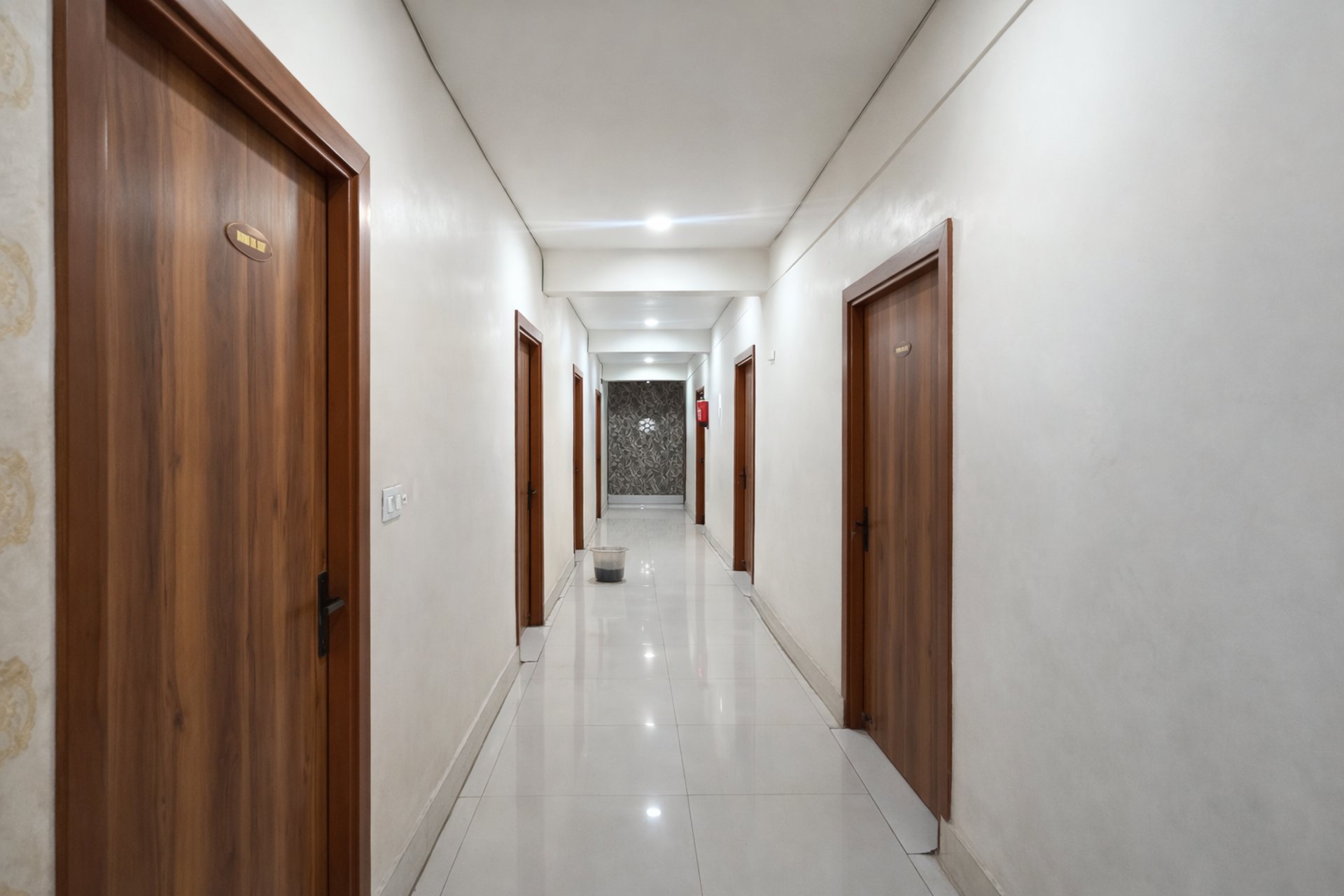 woman wearing yellow long-sleeved dress under white clouds and blue sky during daytime
