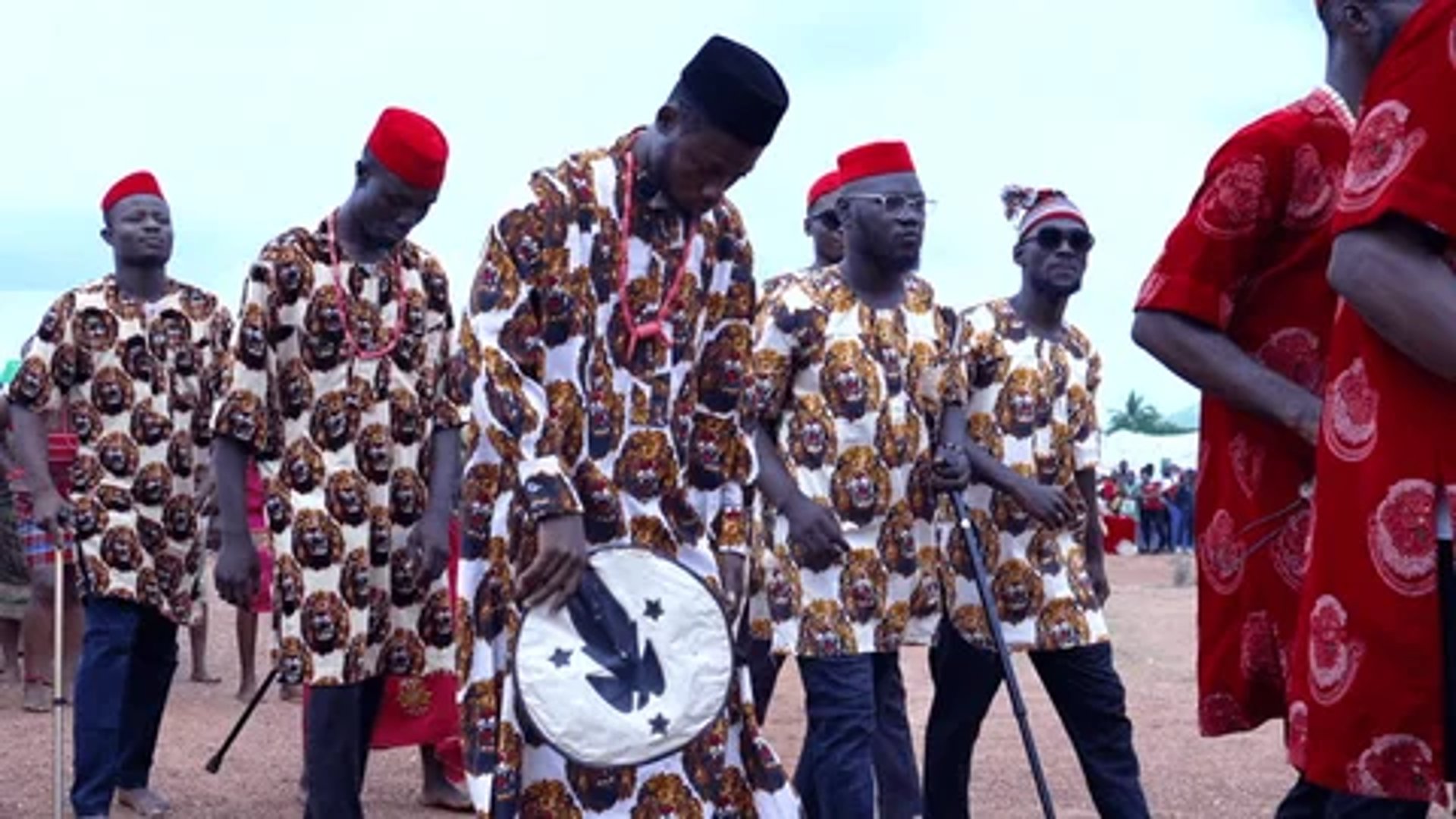 woman wearing yellow long-sleeved dress under white clouds and blue sky during daytime