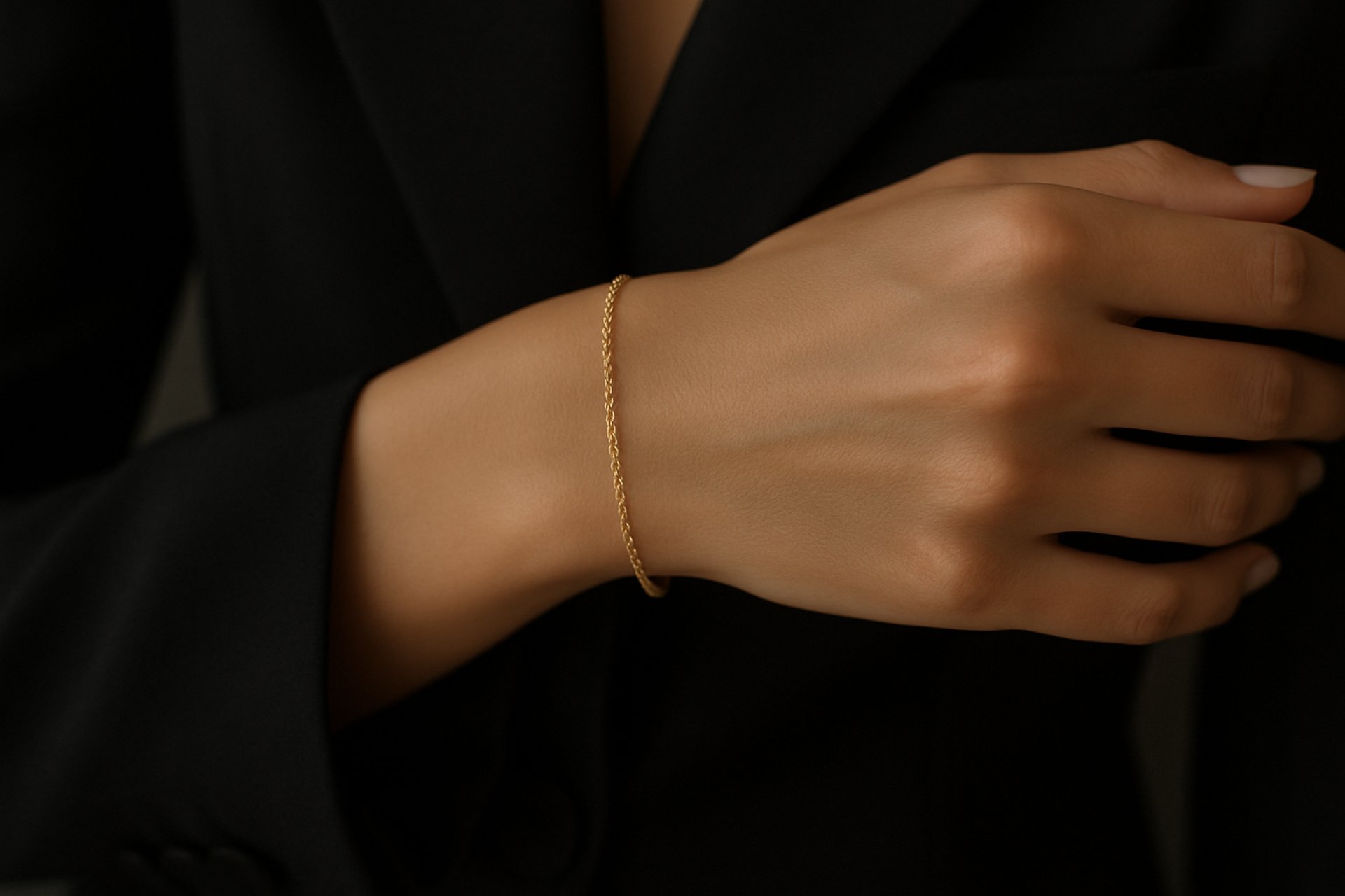 woman in white v neck shirt wearing gold necklace
