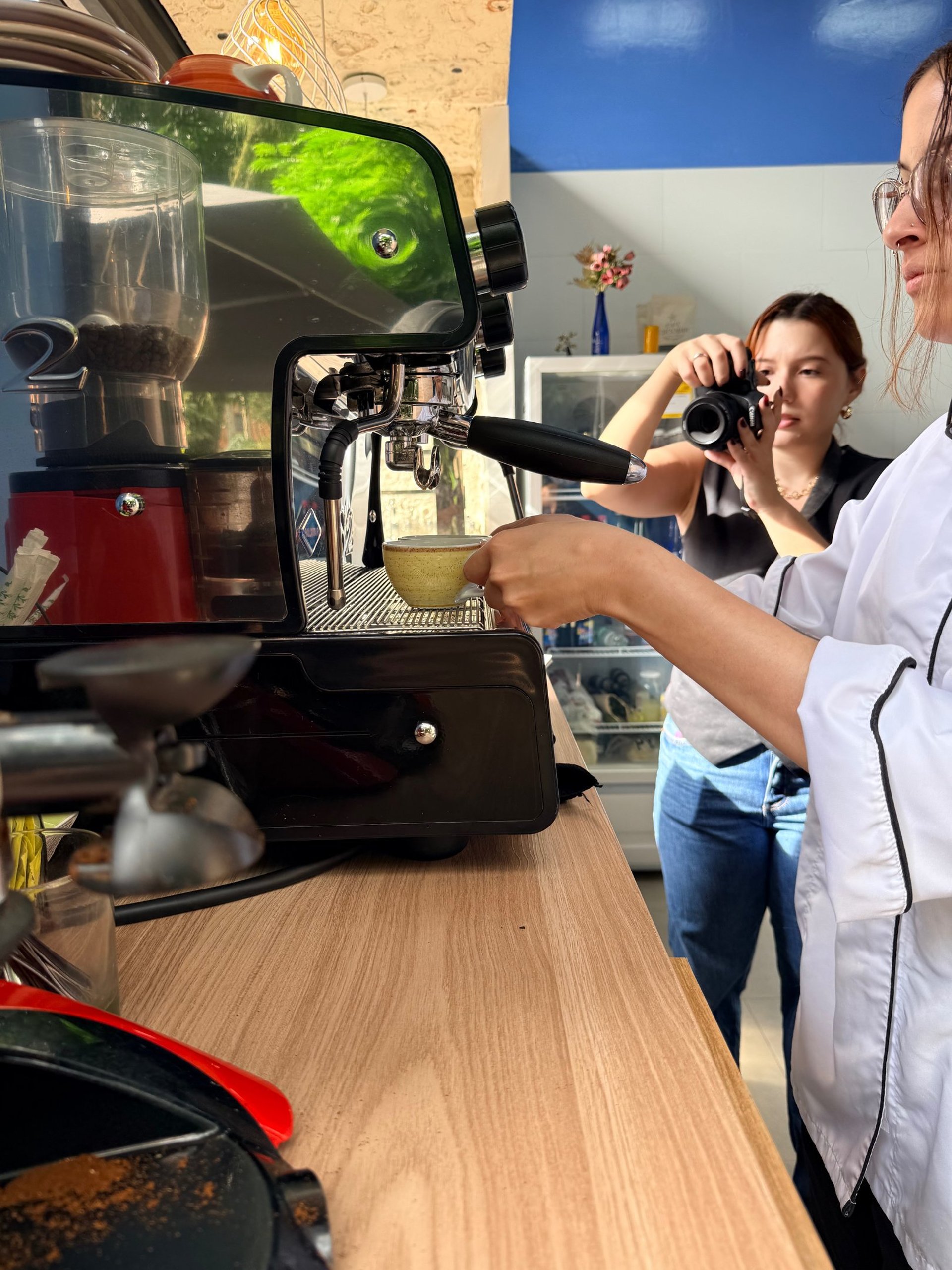 woman wearing yellow long-sleeved dress under white clouds and blue sky during daytime