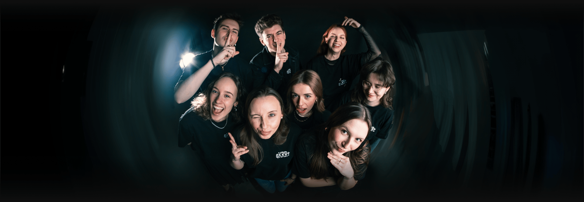 an abstract photo of a curved building with a blue sky in the background