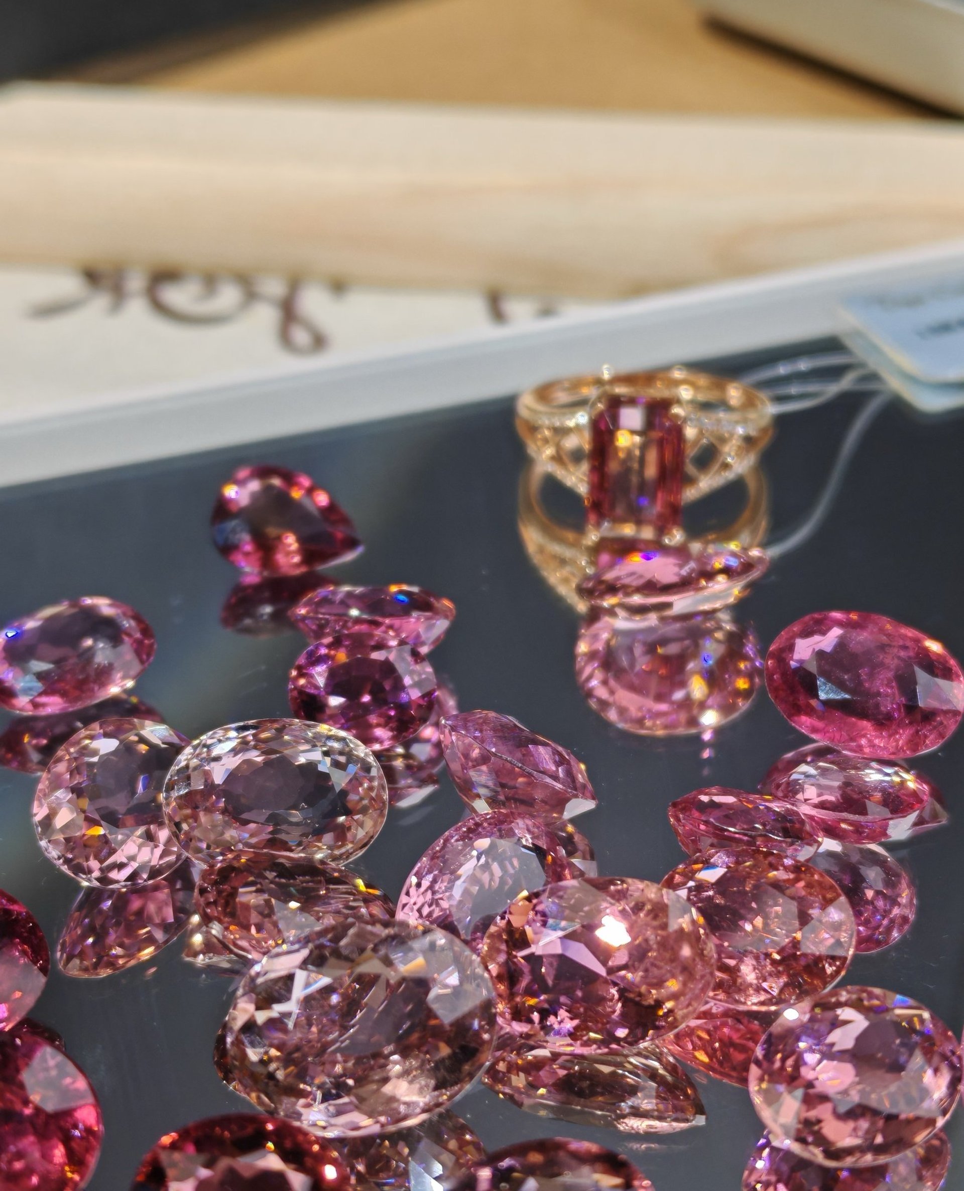 A pile of gold nuggets sitting on top of a wooden table