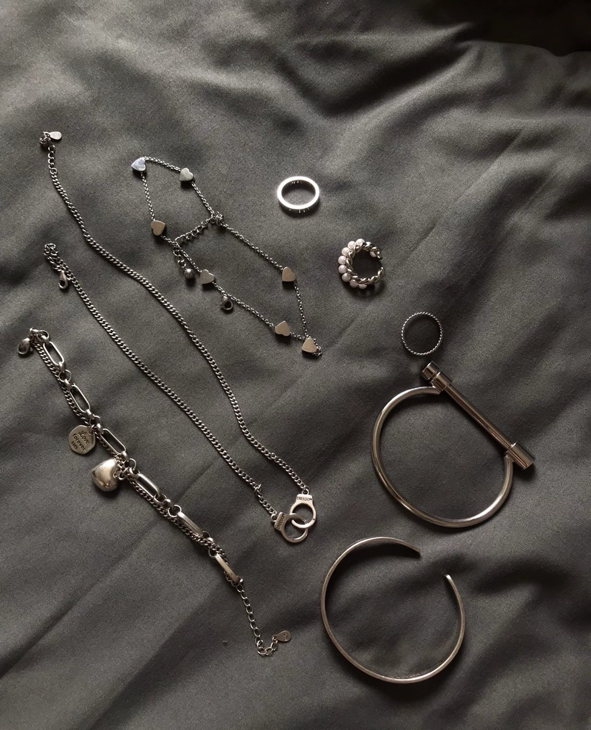 A pile of gold nuggets sitting on top of a wooden table