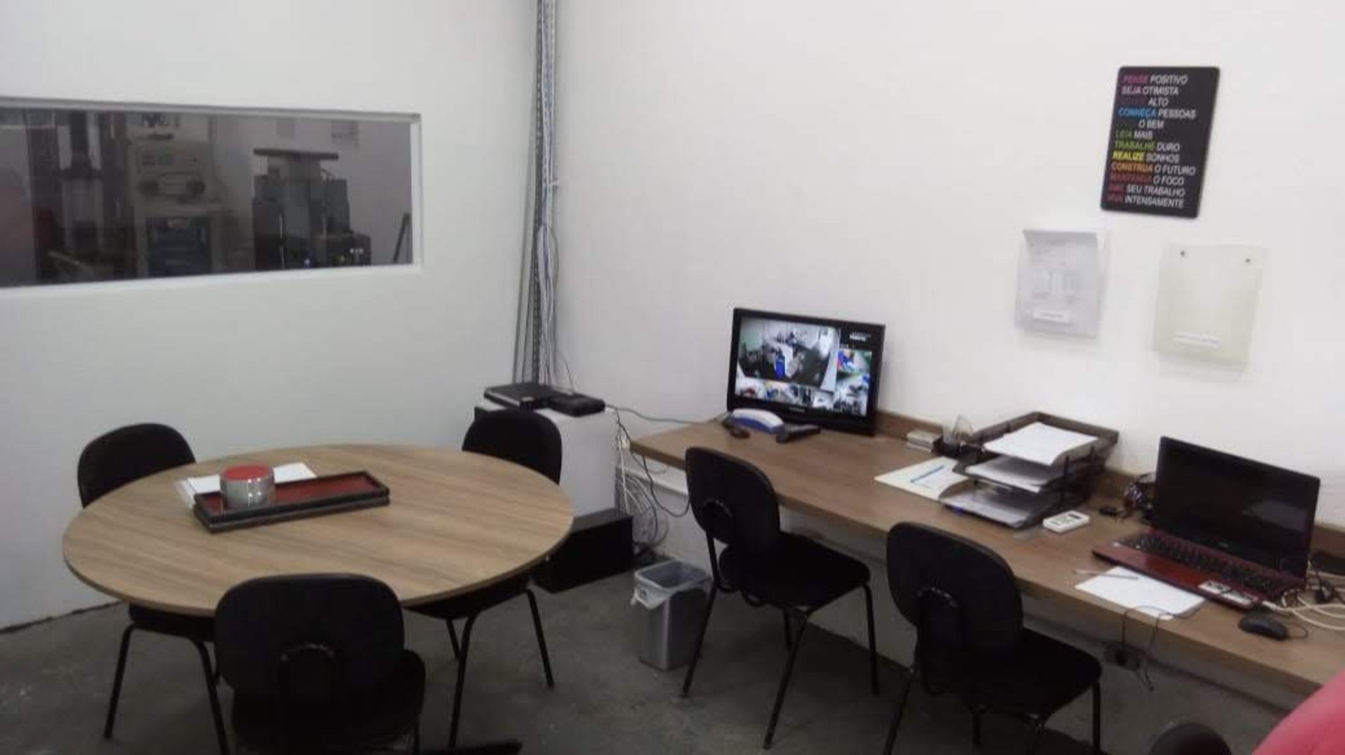 an abstract photo of a curved building with a blue sky in the background