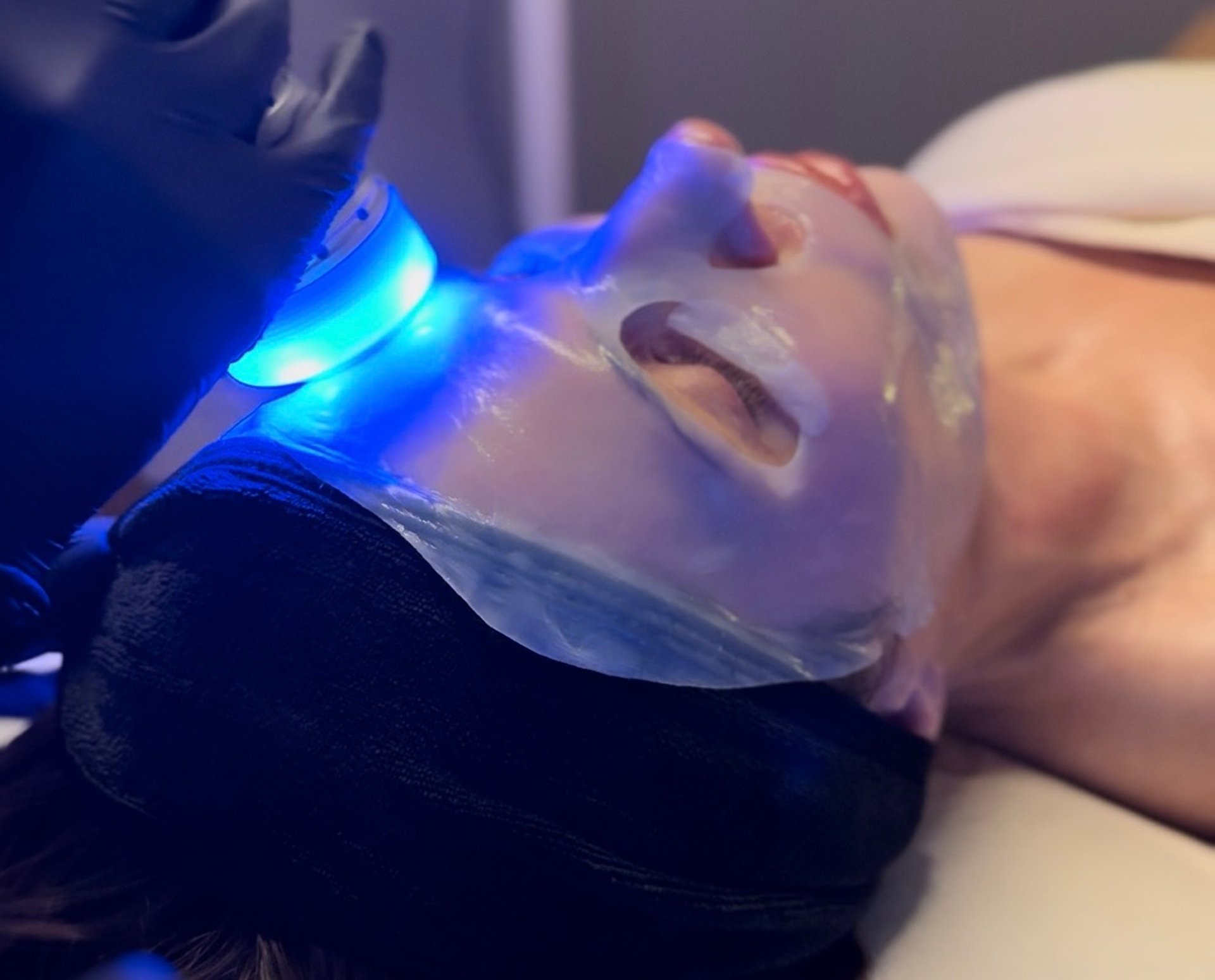 person wearing grey knit sweater