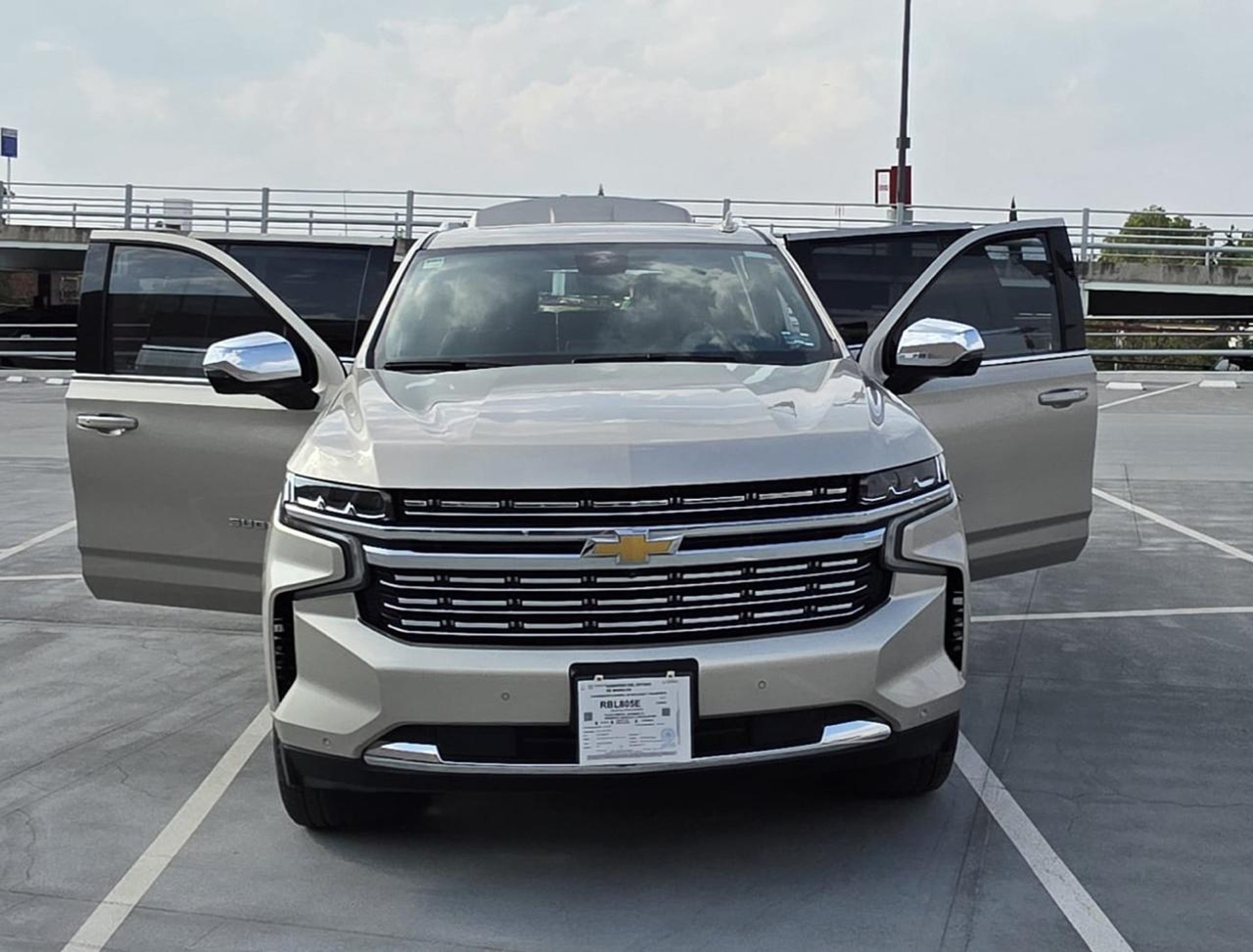black and brown leather padded tub sofa
