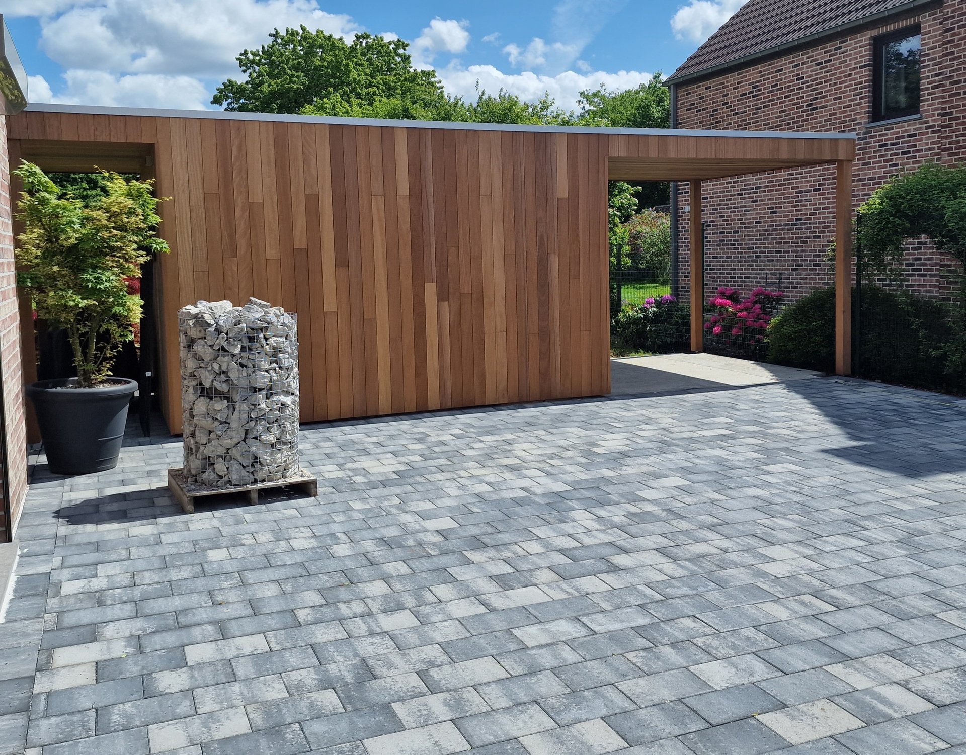 white and brown concrete building near green grass field during daytime
