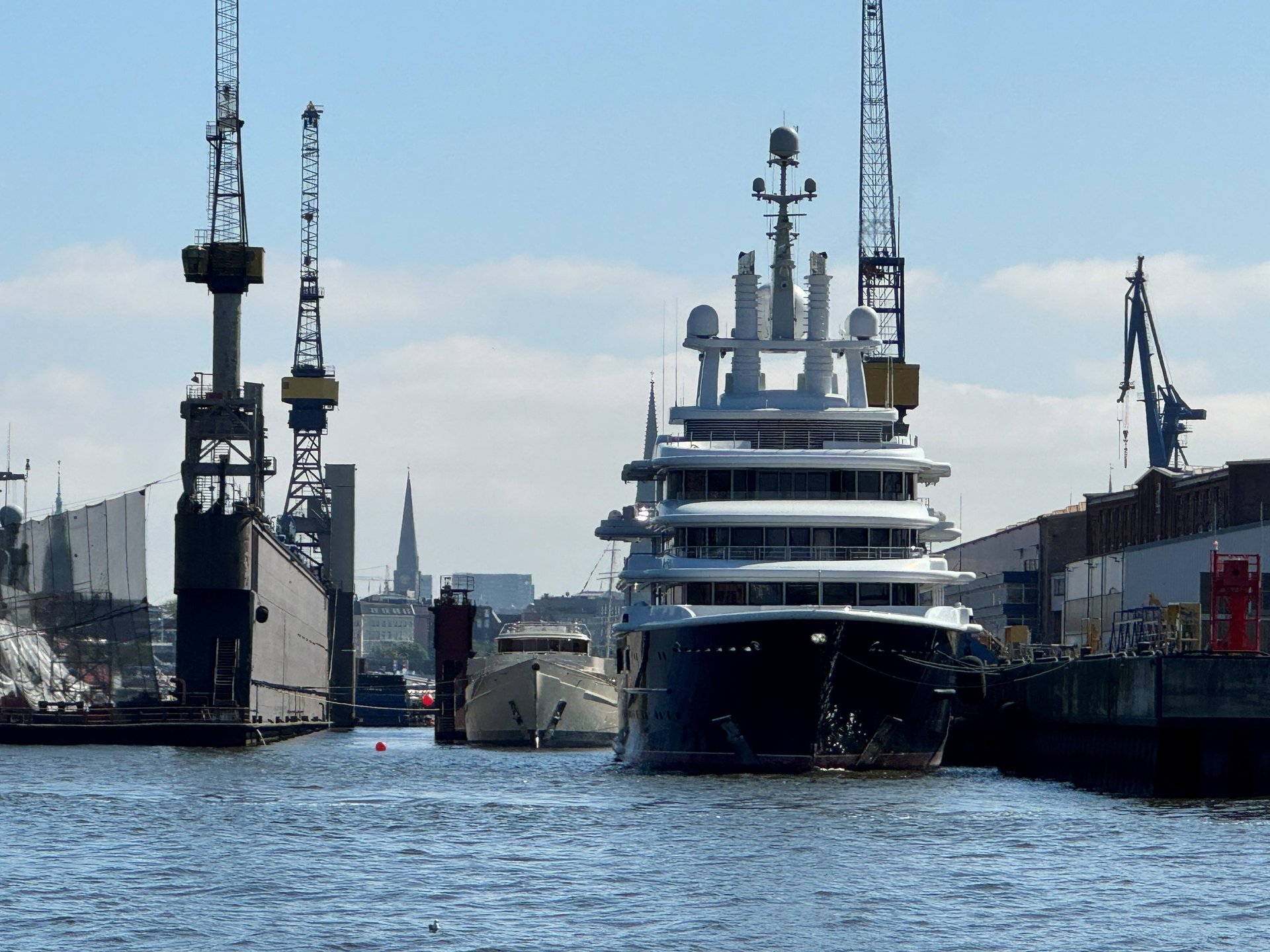 black and brown leather padded tub sofa