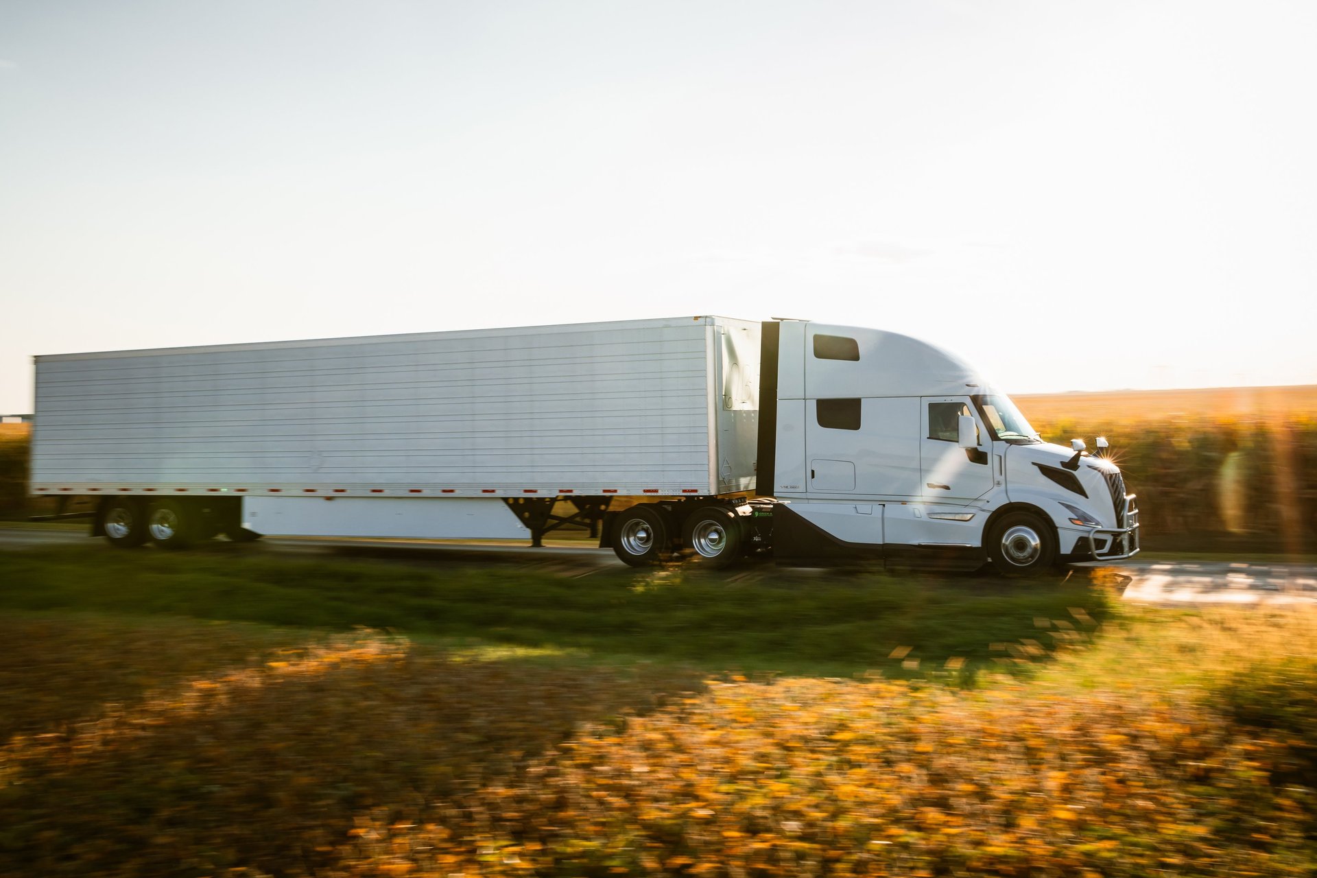 black and brown leather padded tub sofa