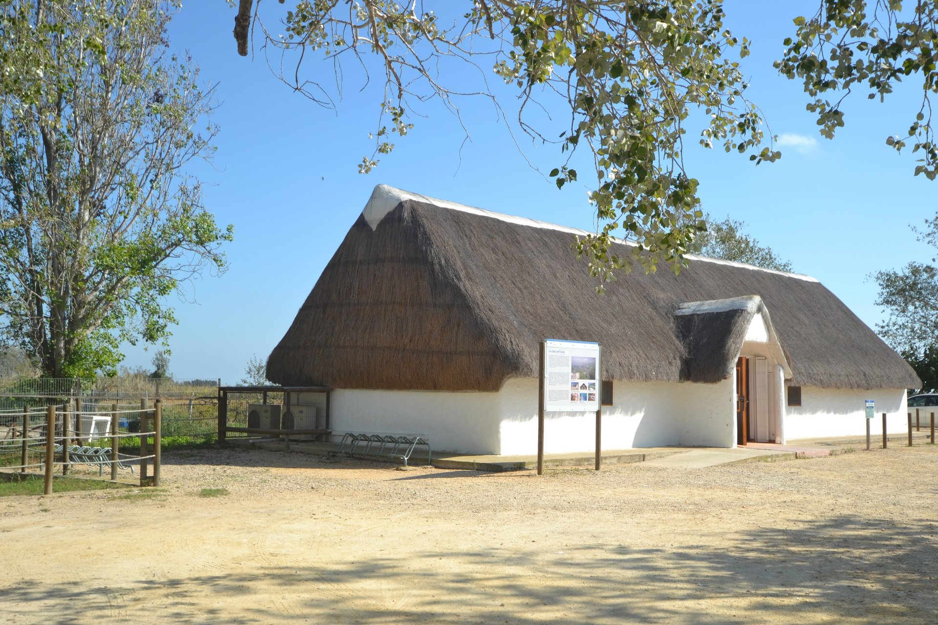 black fishing rod and body of water during golden hour