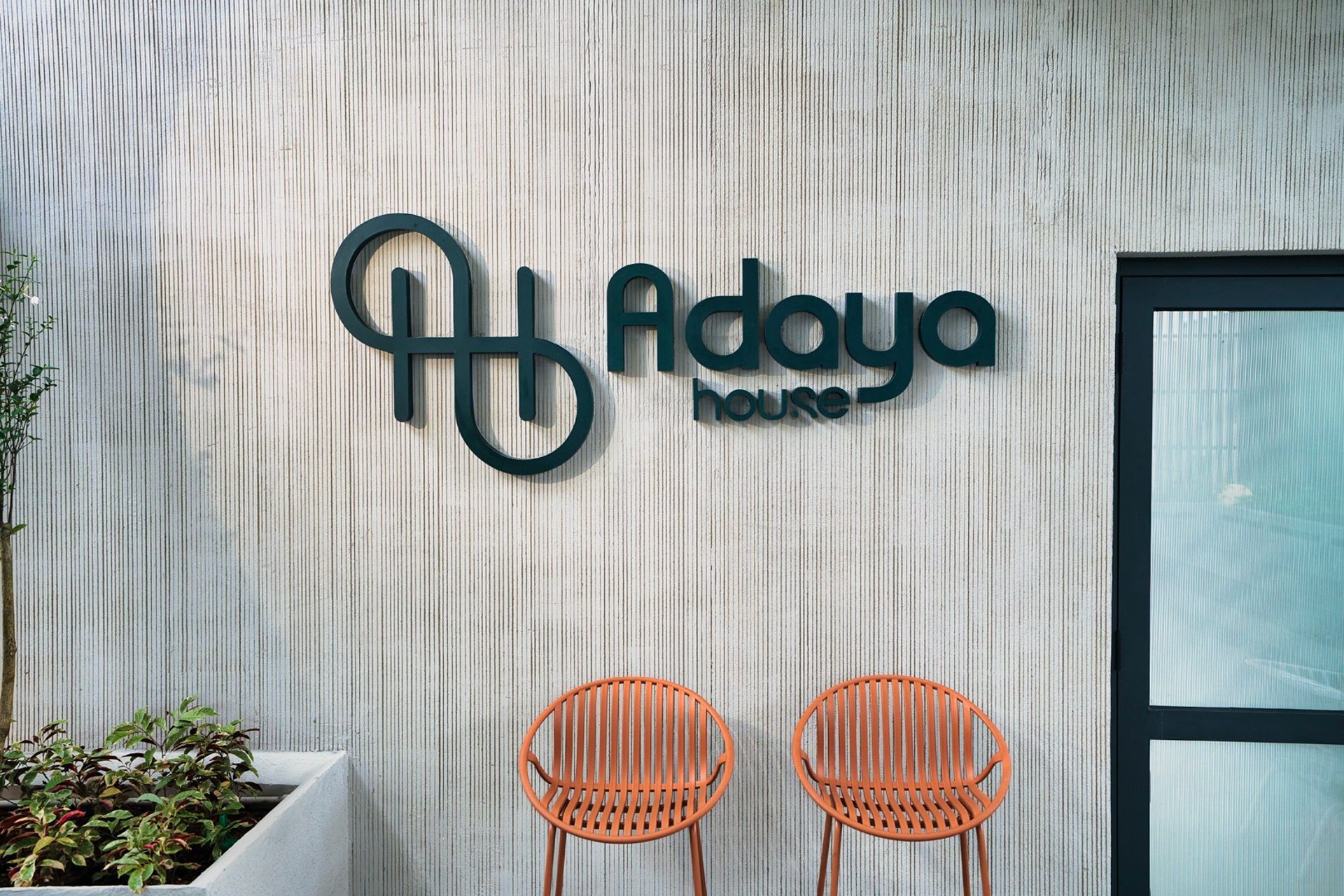 black and brown leather padded tub sofa