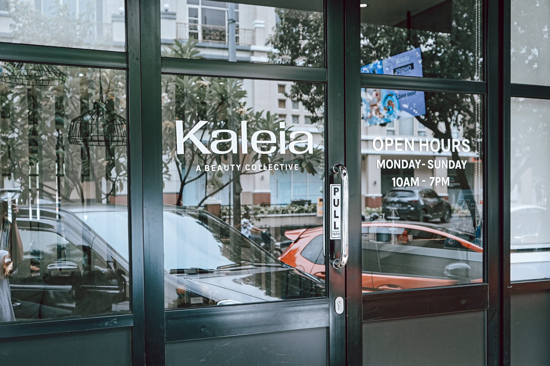 an abstract photo of a curved building with a blue sky in the background