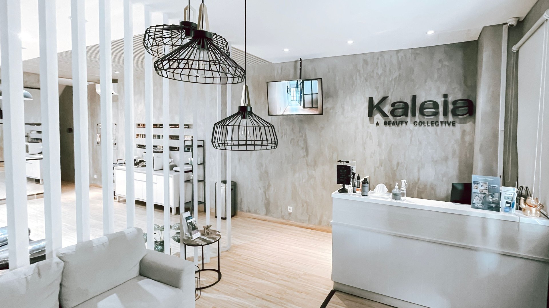 an abstract photo of a curved building with a blue sky in the background