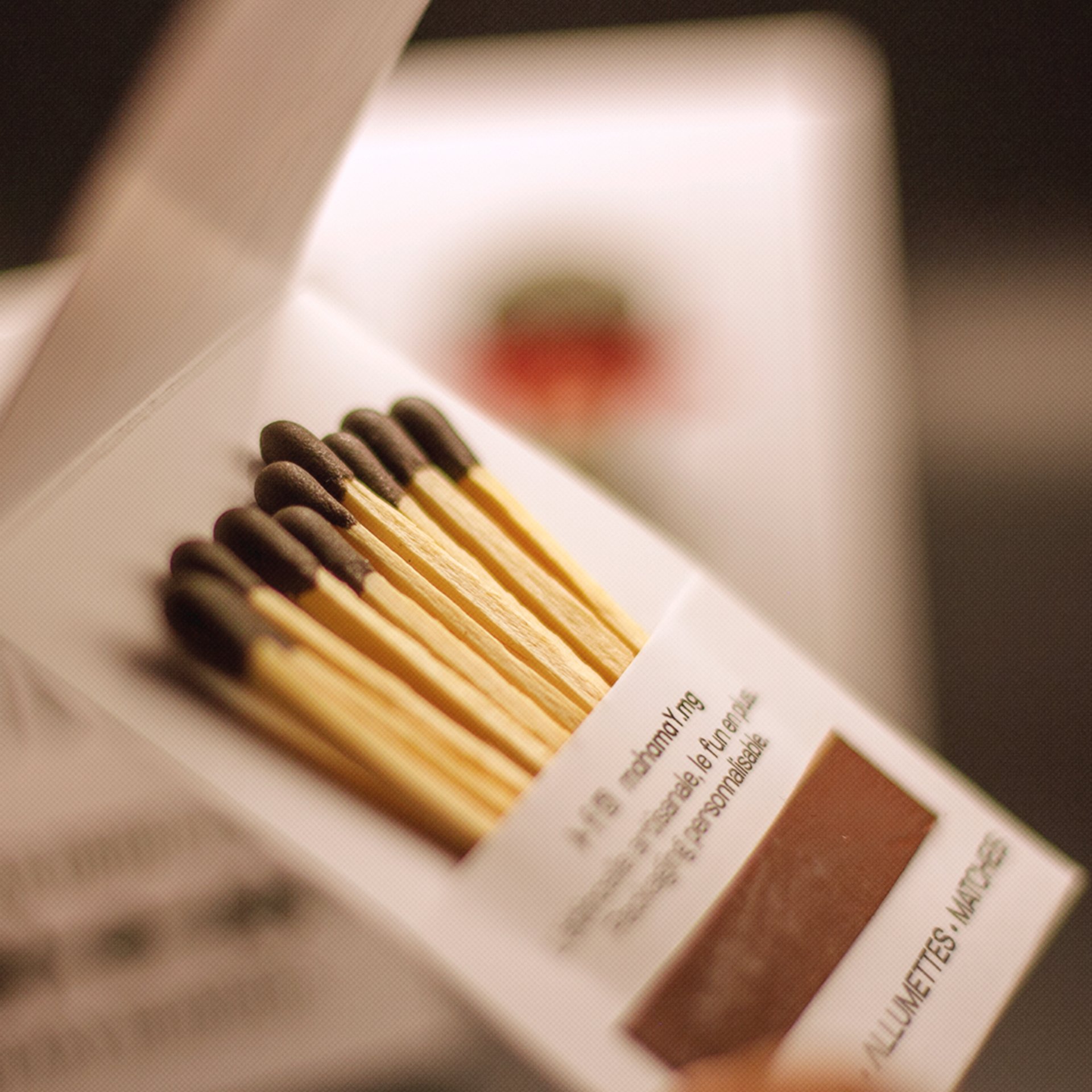 an abstract photo of a curved building with a blue sky in the background