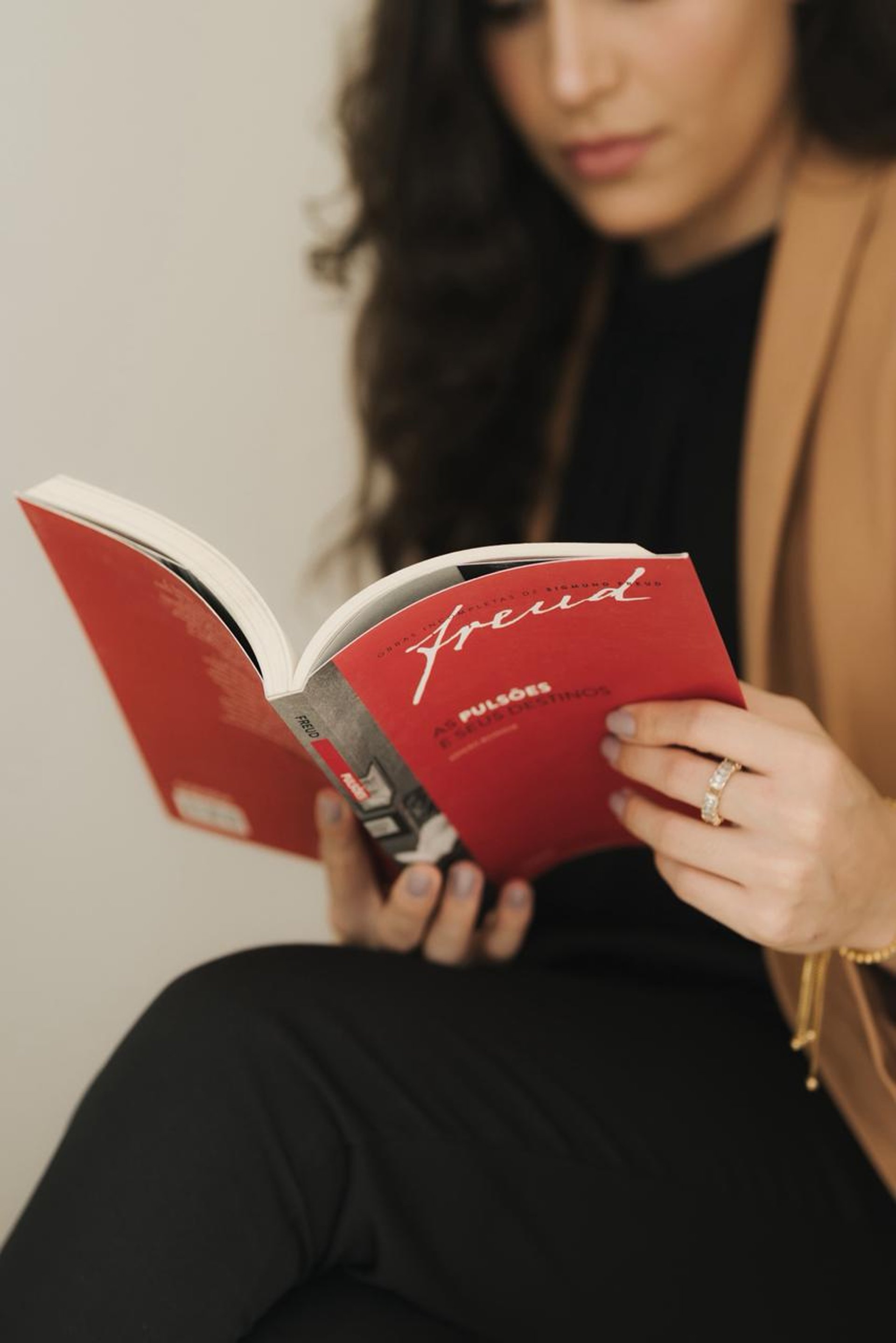 an abstract photo of a curved building with a blue sky in the background
