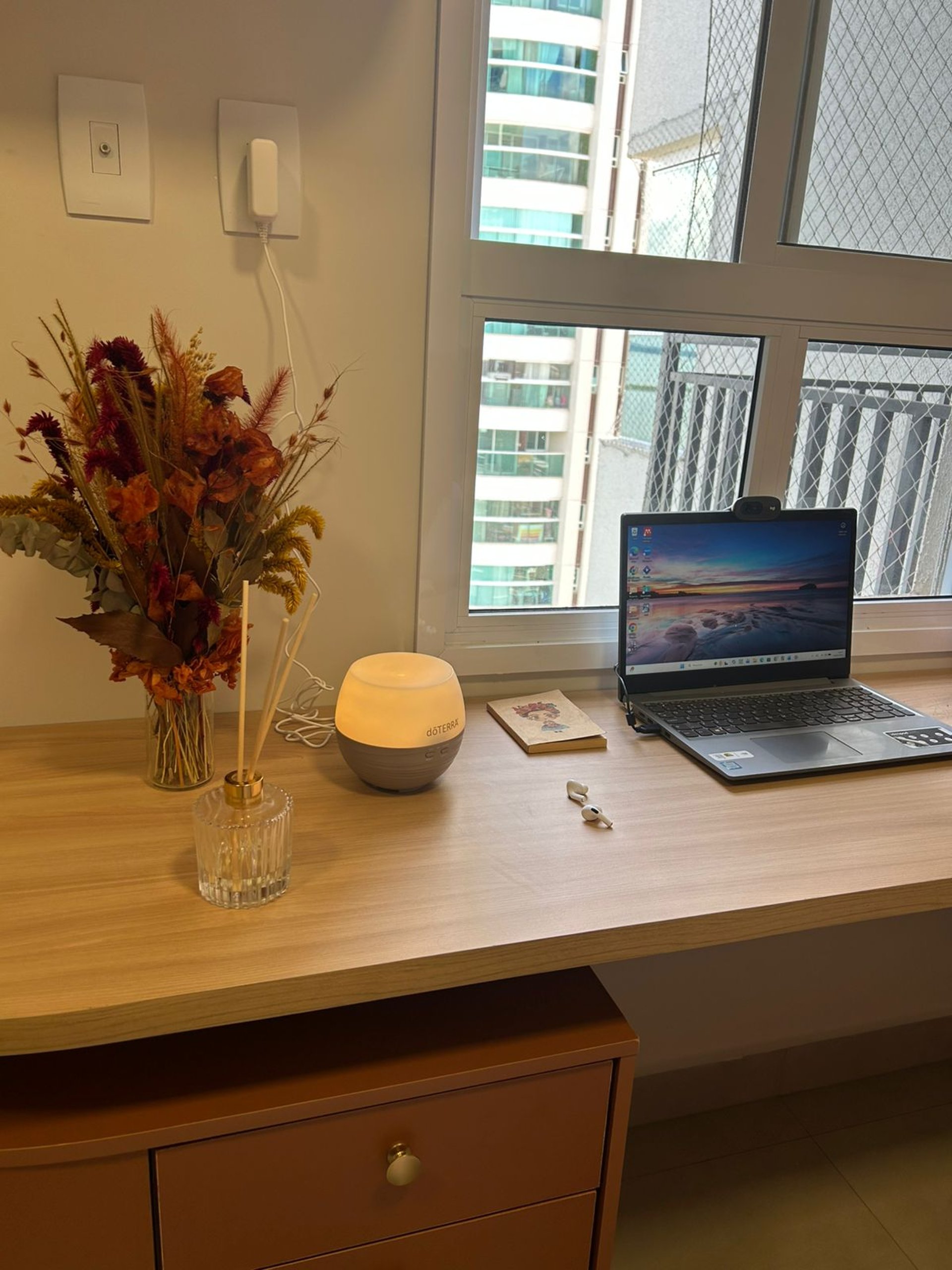 an abstract photo of a curved building with a blue sky in the background