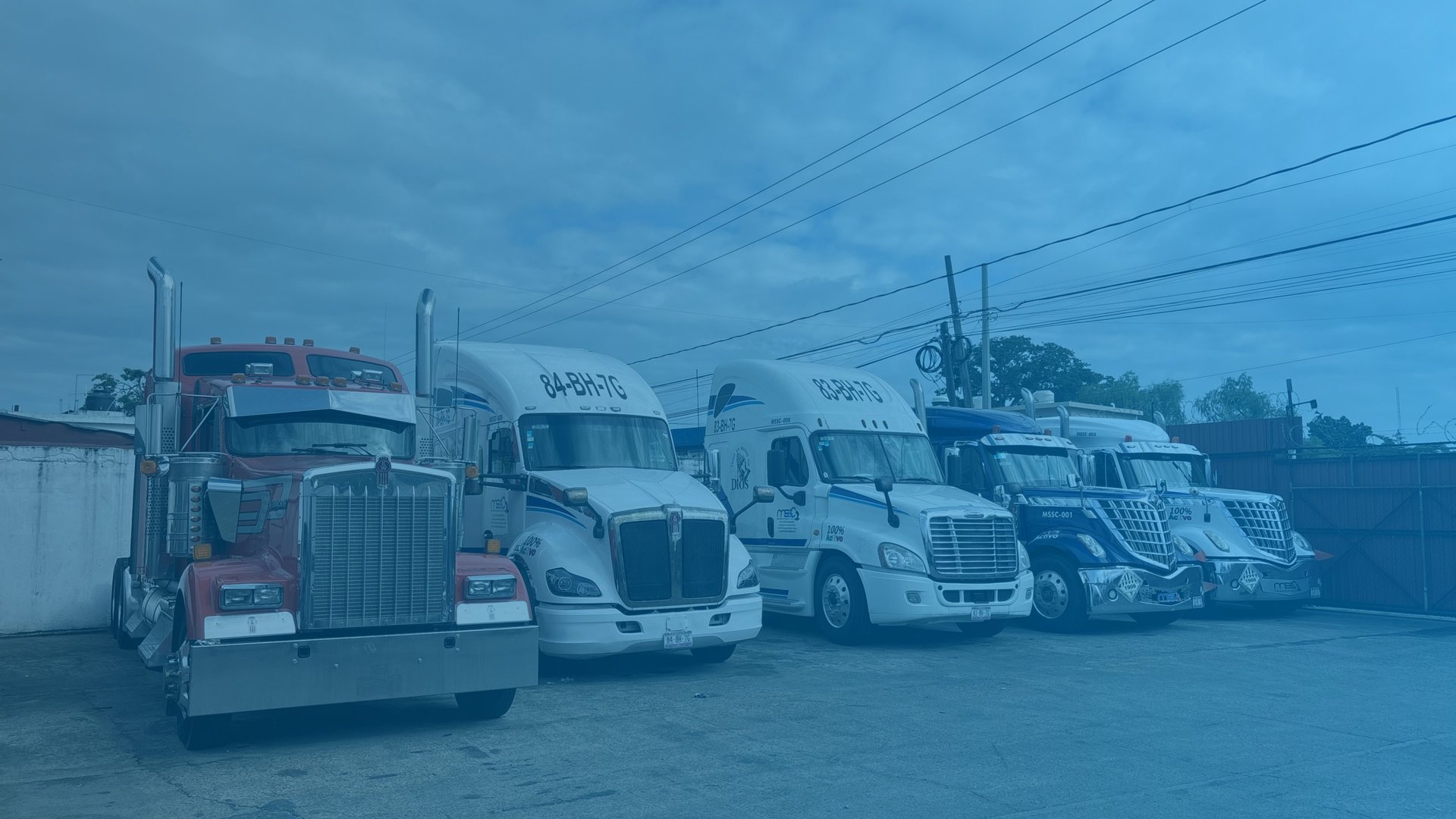 an abstract photo of a curved building with a blue sky in the background