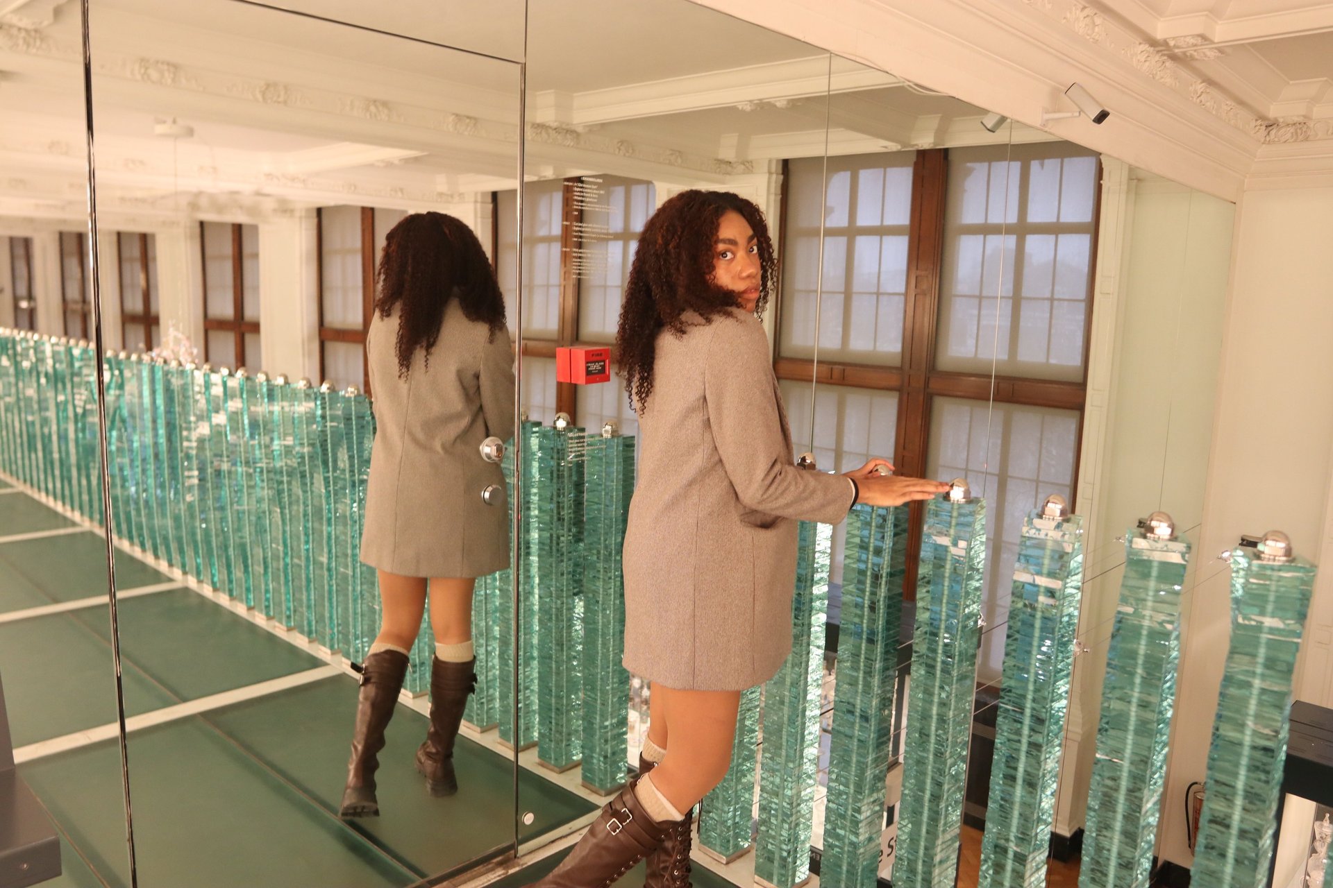 an abstract photo of a curved building with a blue sky in the background