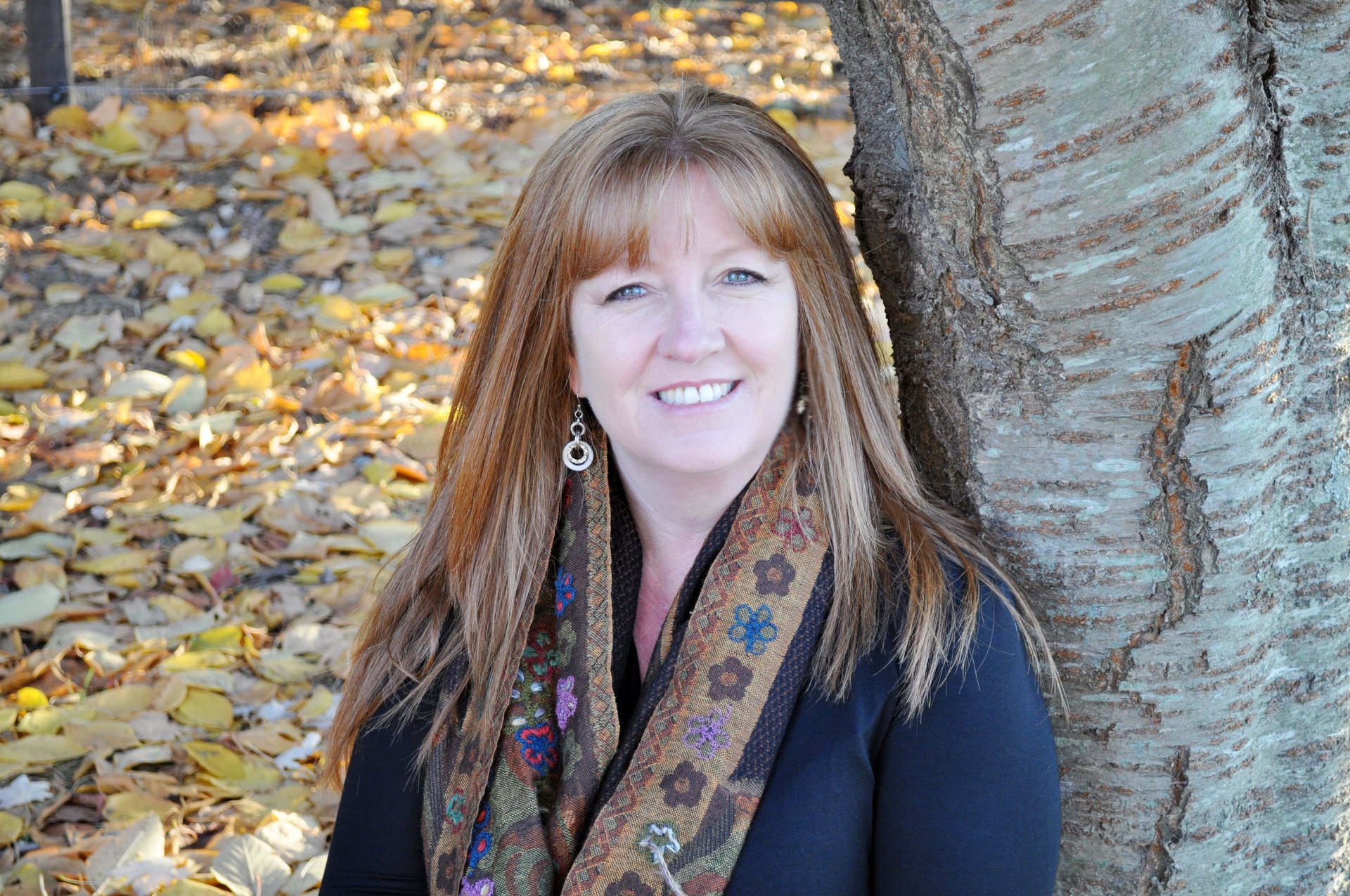 Brenna, founder of Next Chapter Assistant, a retired teacher offering home organizing and homeschool space help.