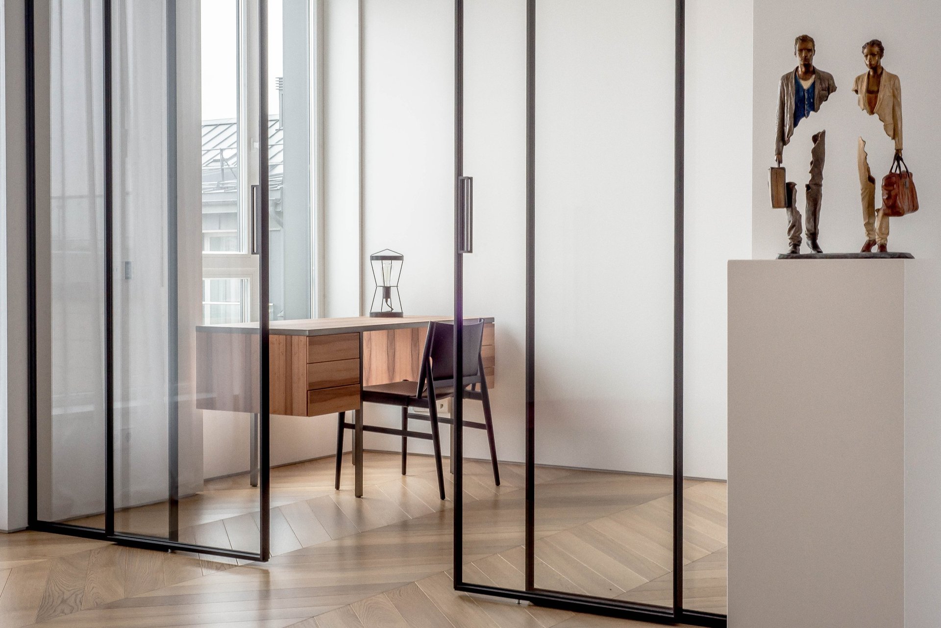 an abstract photo of a curved building with a blue sky in the background