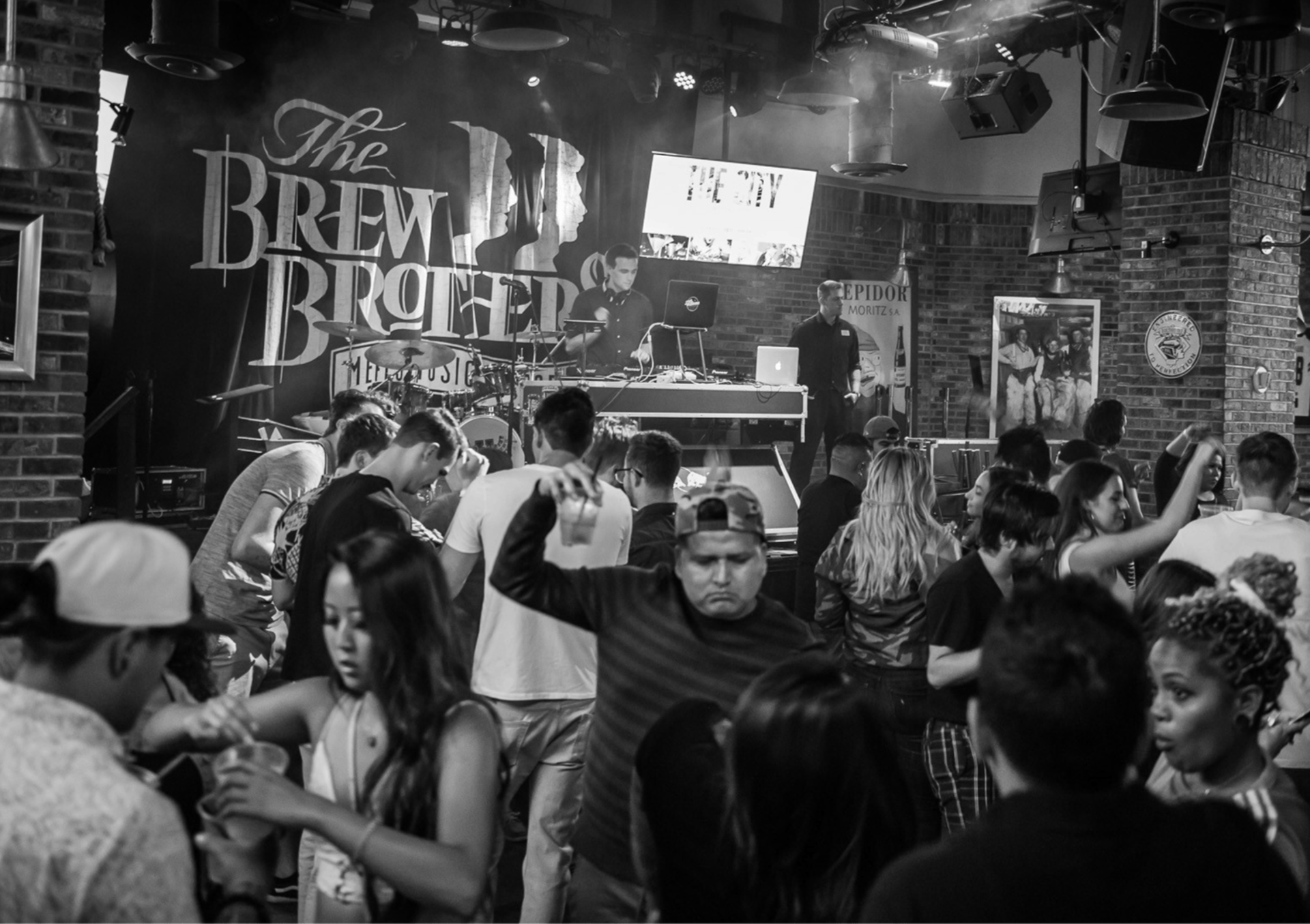 an abstract photo of a curved building with a blue sky in the background