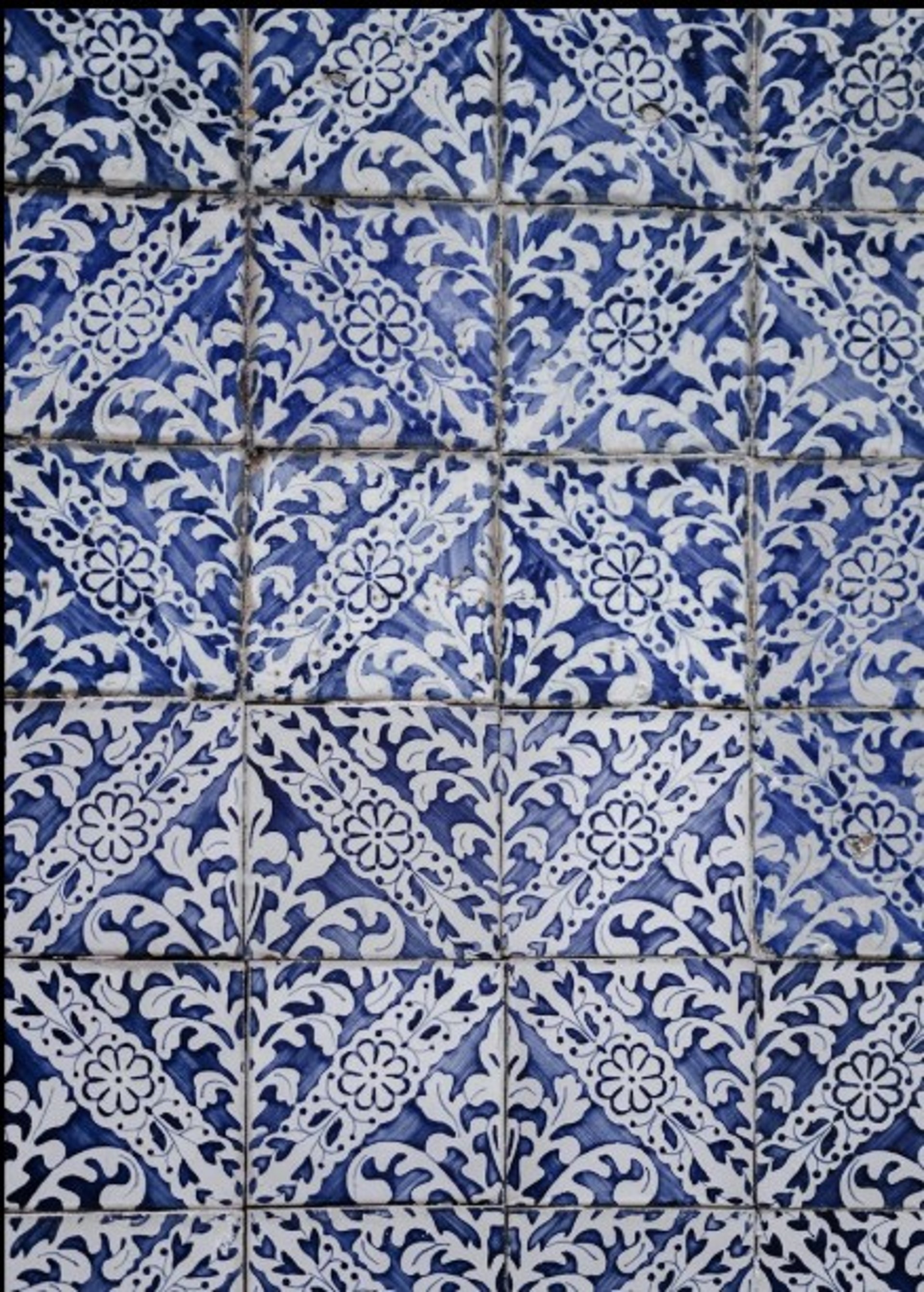 A circular ceiling with blue glass balls in it