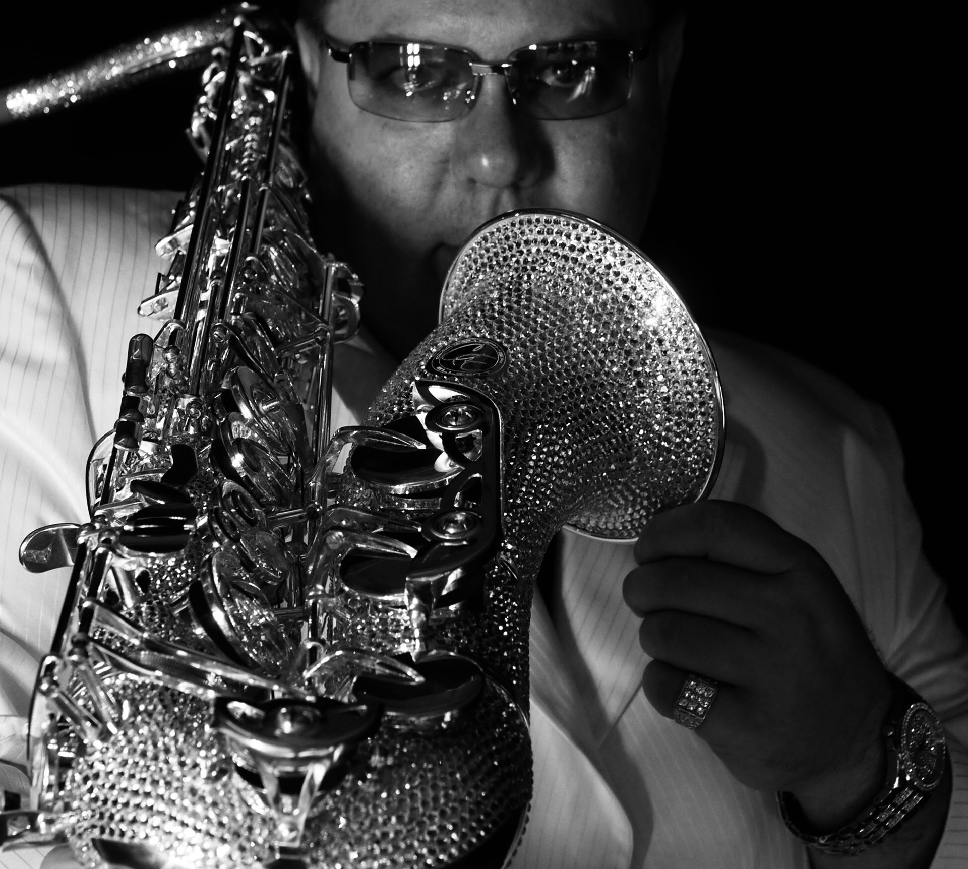 an abstract photo of a curved building with a blue sky in the background