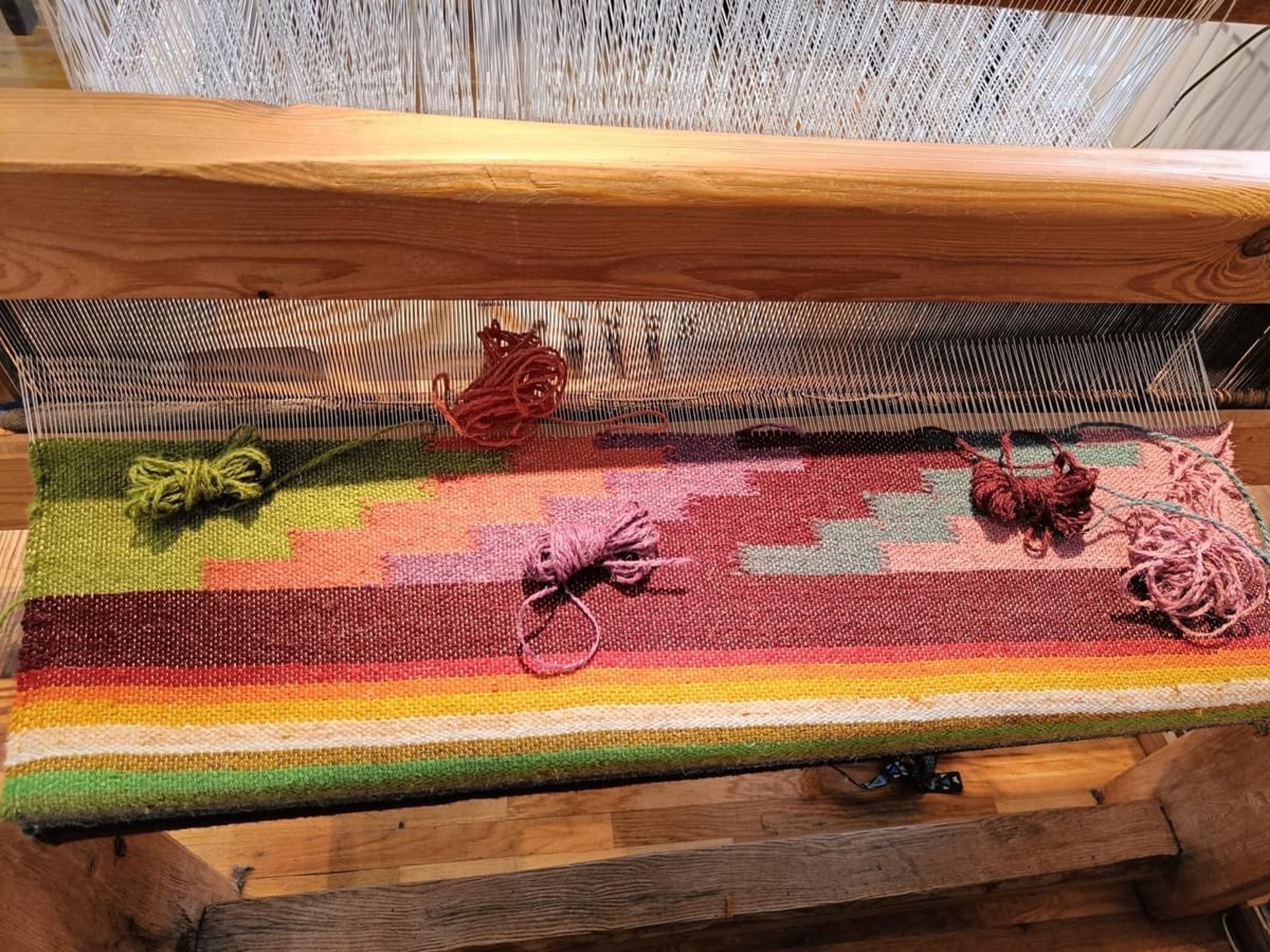 a close up of an old weaving machine